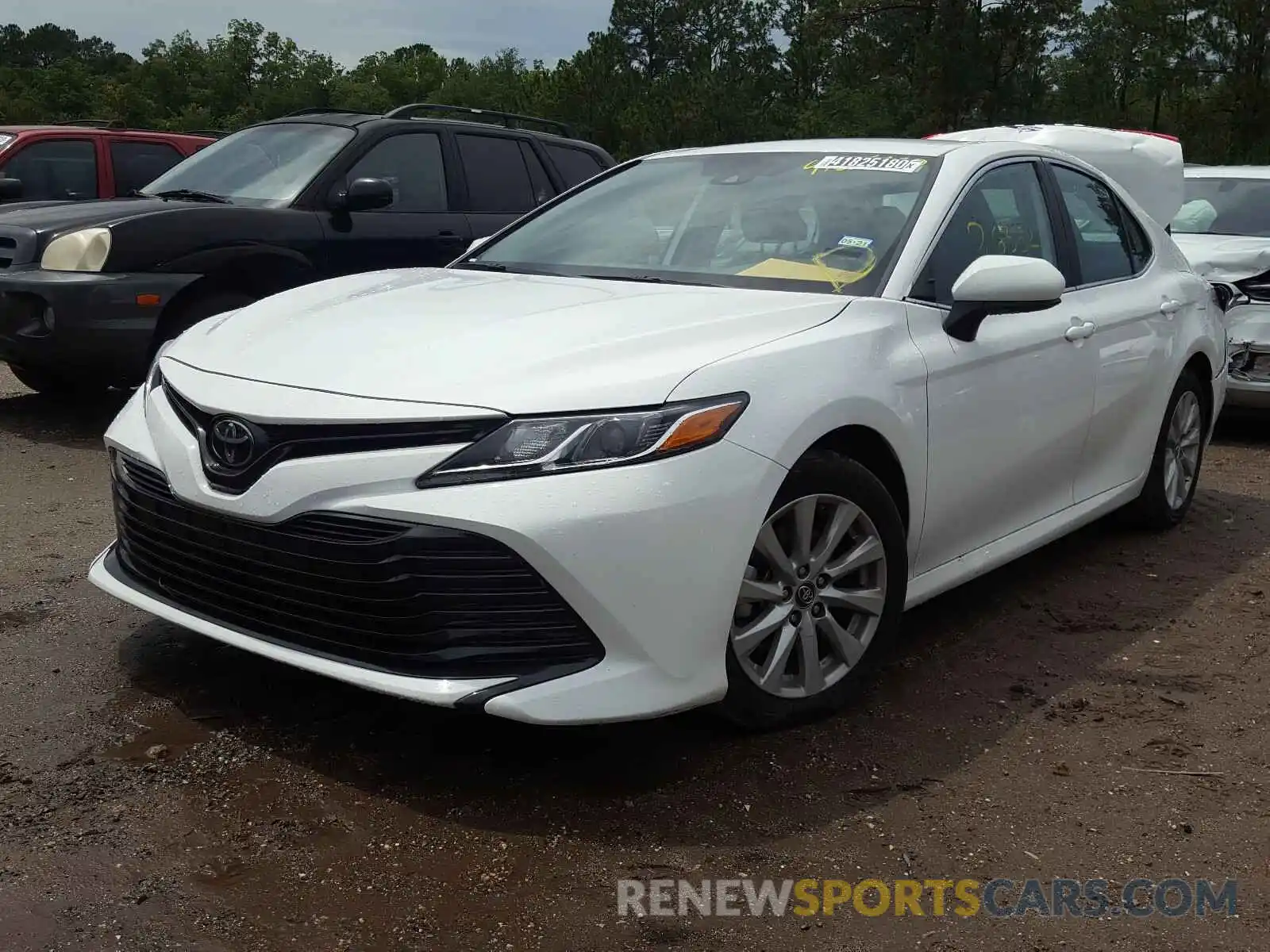 2 Photograph of a damaged car 4T1B11HK2KU806074 TOYOTA CAMRY 2019