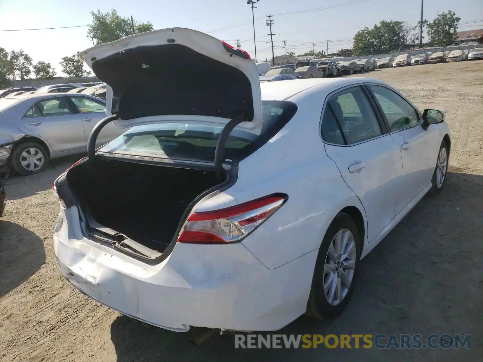 4 Photograph of a damaged car 4T1B11HK2KU807578 TOYOTA CAMRY 2019