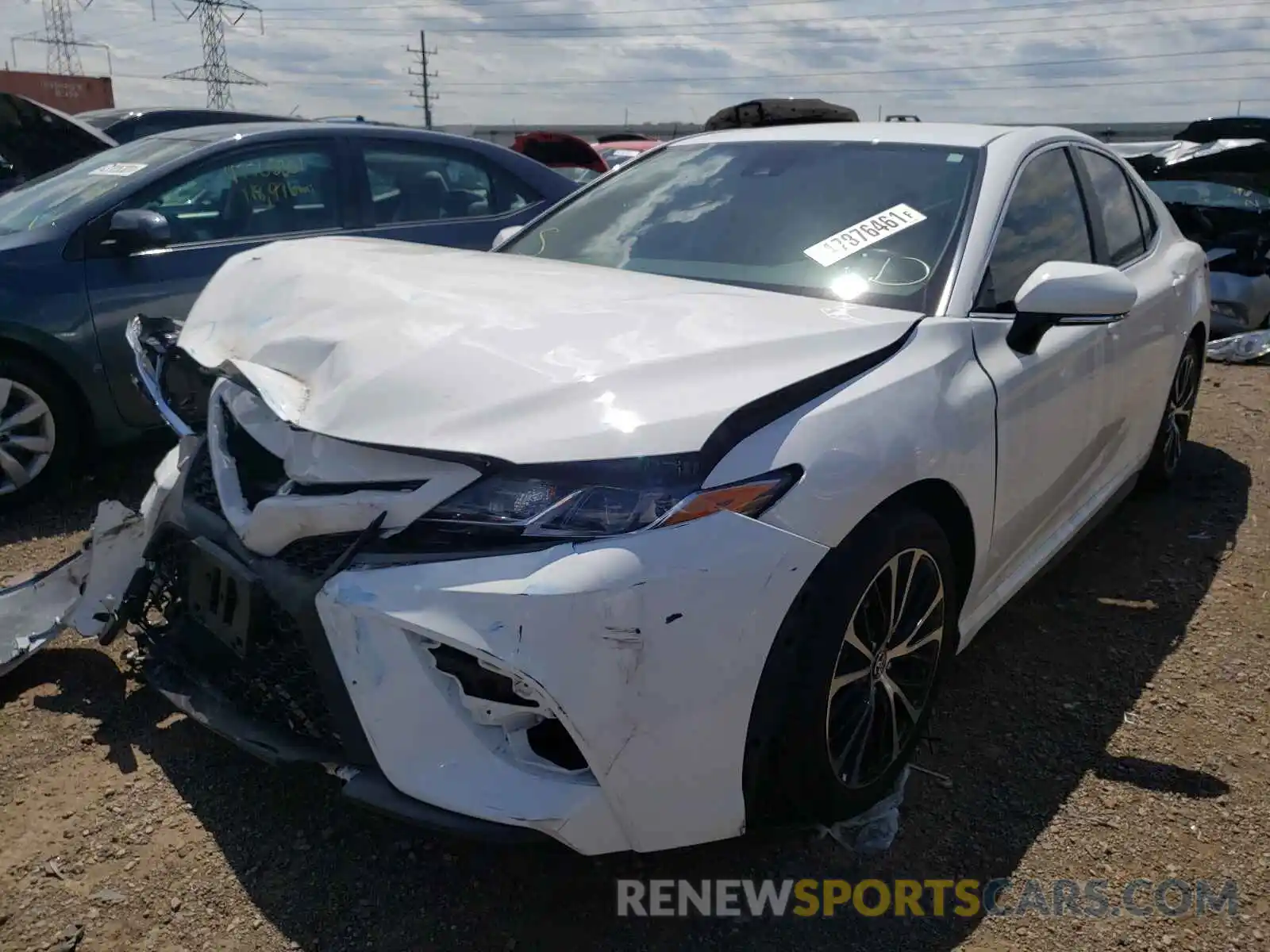 2 Photograph of a damaged car 4T1B11HK2KU829077 TOYOTA CAMRY 2019