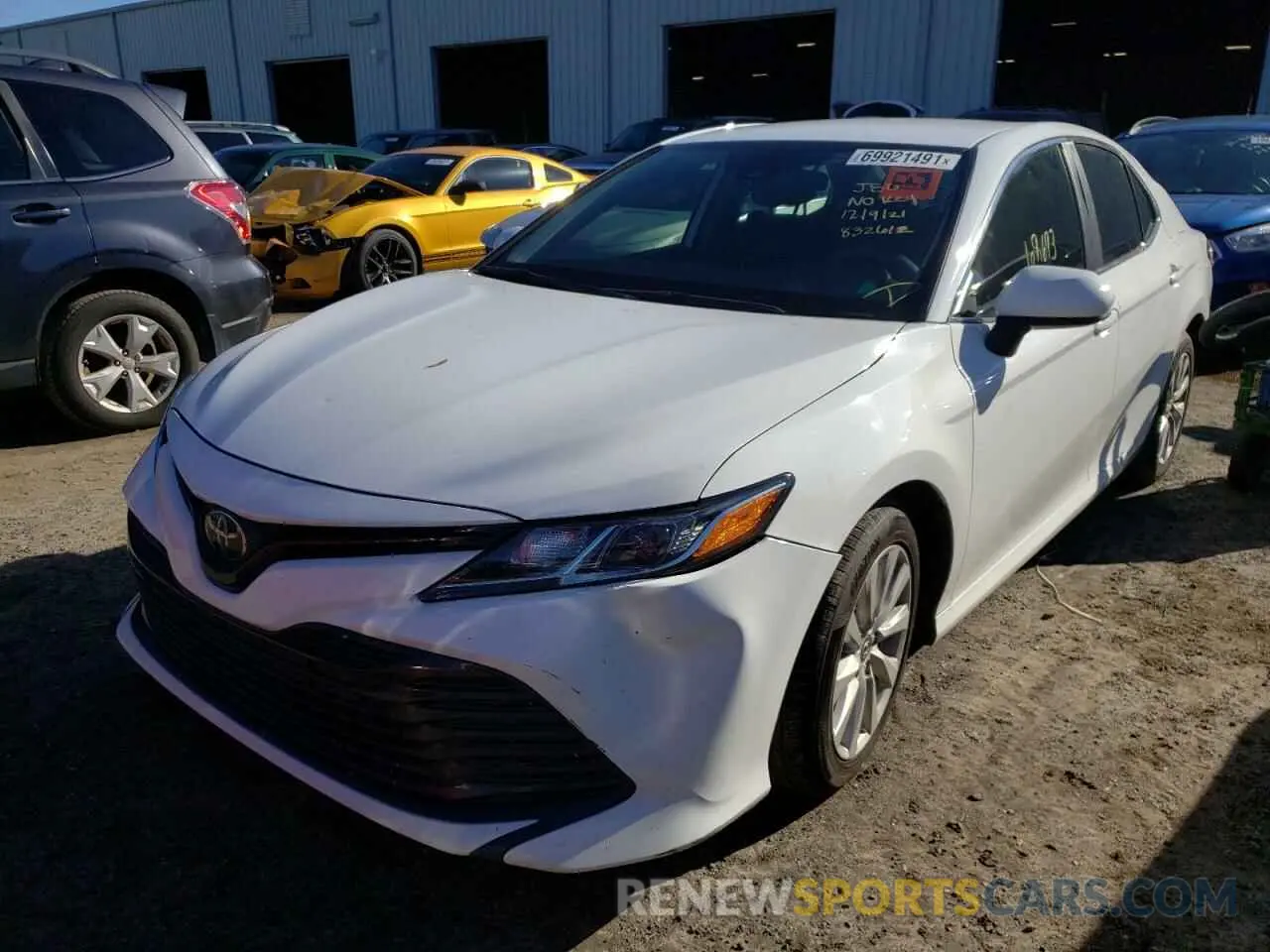 2 Photograph of a damaged car 4T1B11HK2KU832612 TOYOTA CAMRY 2019