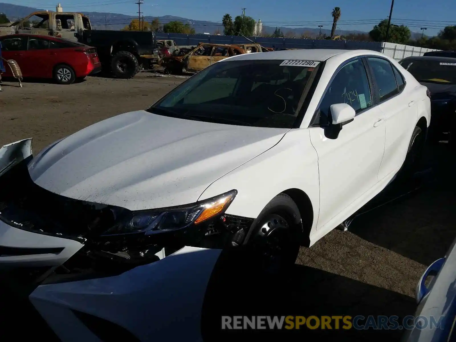 2 Photograph of a damaged car 4T1B11HK2KU840614 TOYOTA CAMRY 2019