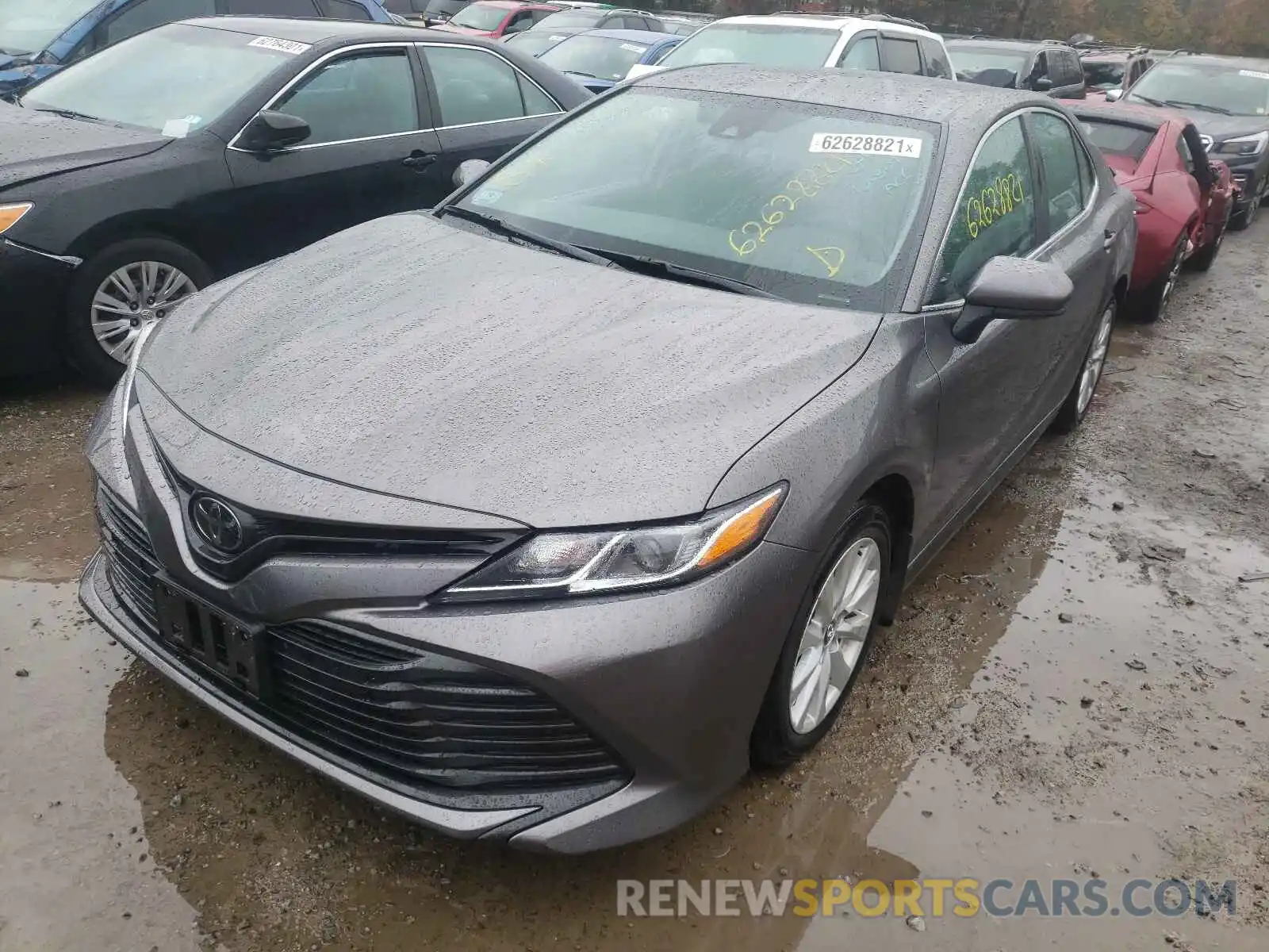 2 Photograph of a damaged car 4T1B11HK2KU847952 TOYOTA CAMRY 2019