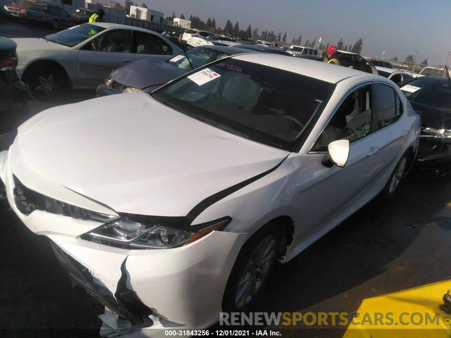 2 Photograph of a damaged car 4T1B11HK3KU172094 TOYOTA CAMRY 2019