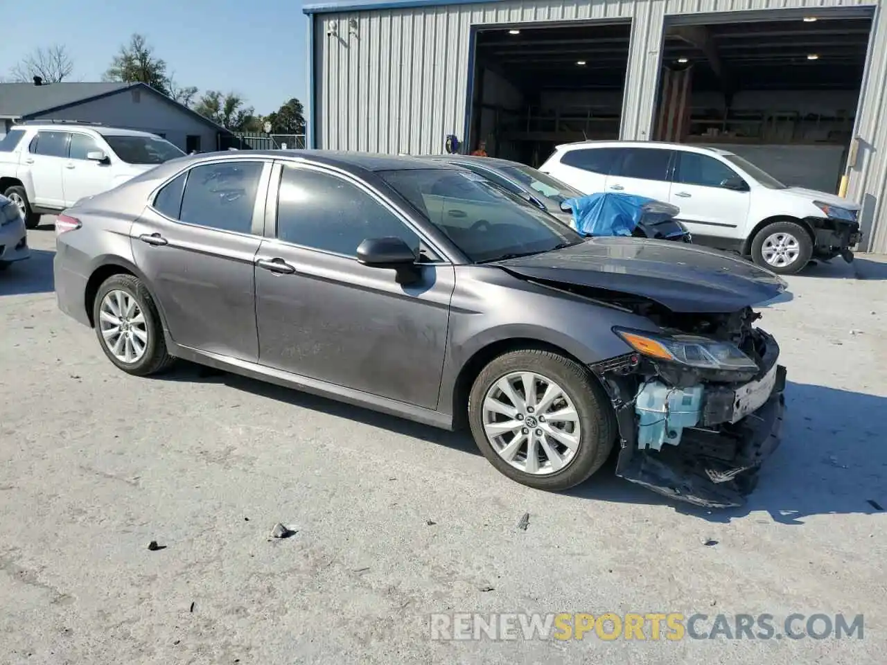 4 Photograph of a damaged car 4T1B11HK3KU178753 TOYOTA CAMRY 2019