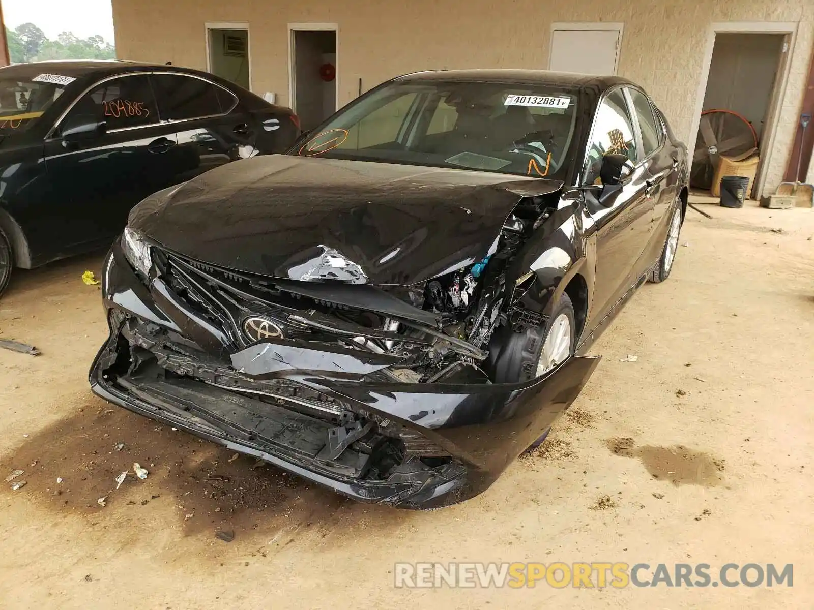 2 Photograph of a damaged car 4T1B11HK3KU181989 TOYOTA CAMRY 2019