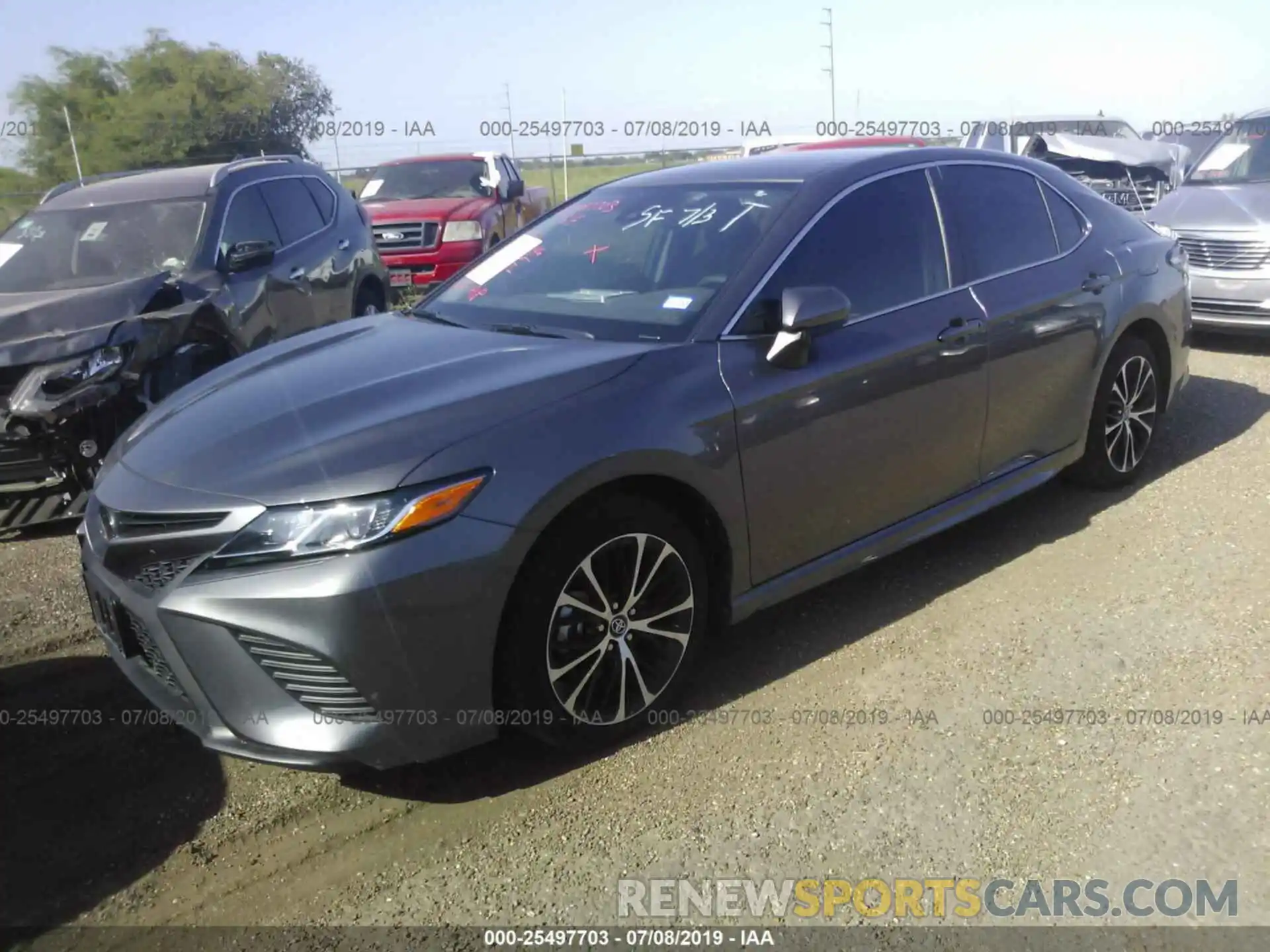 2 Photograph of a damaged car 4T1B11HK3KU183631 TOYOTA CAMRY 2019