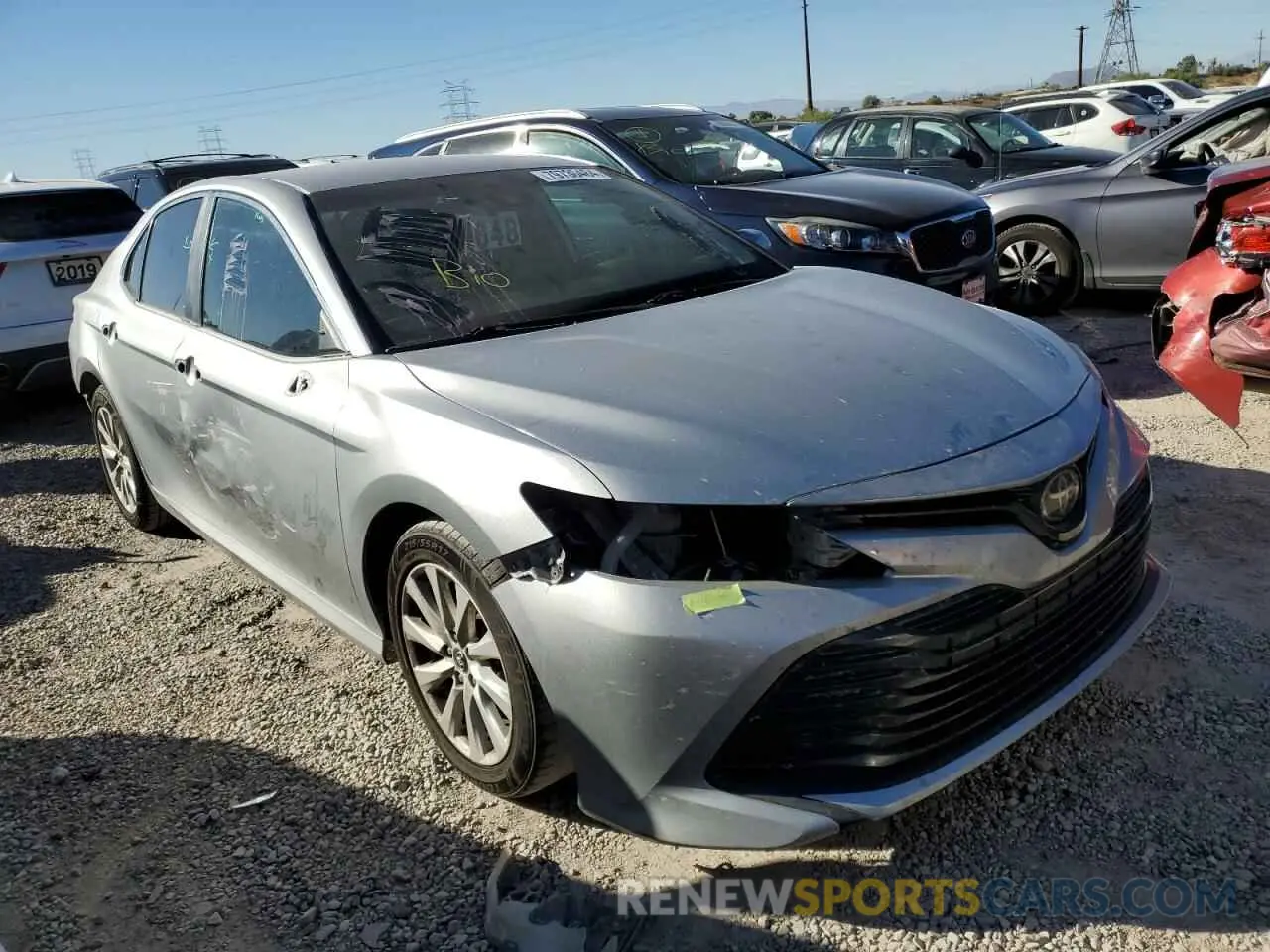 4 Photograph of a damaged car 4T1B11HK3KU185055 TOYOTA CAMRY 2019
