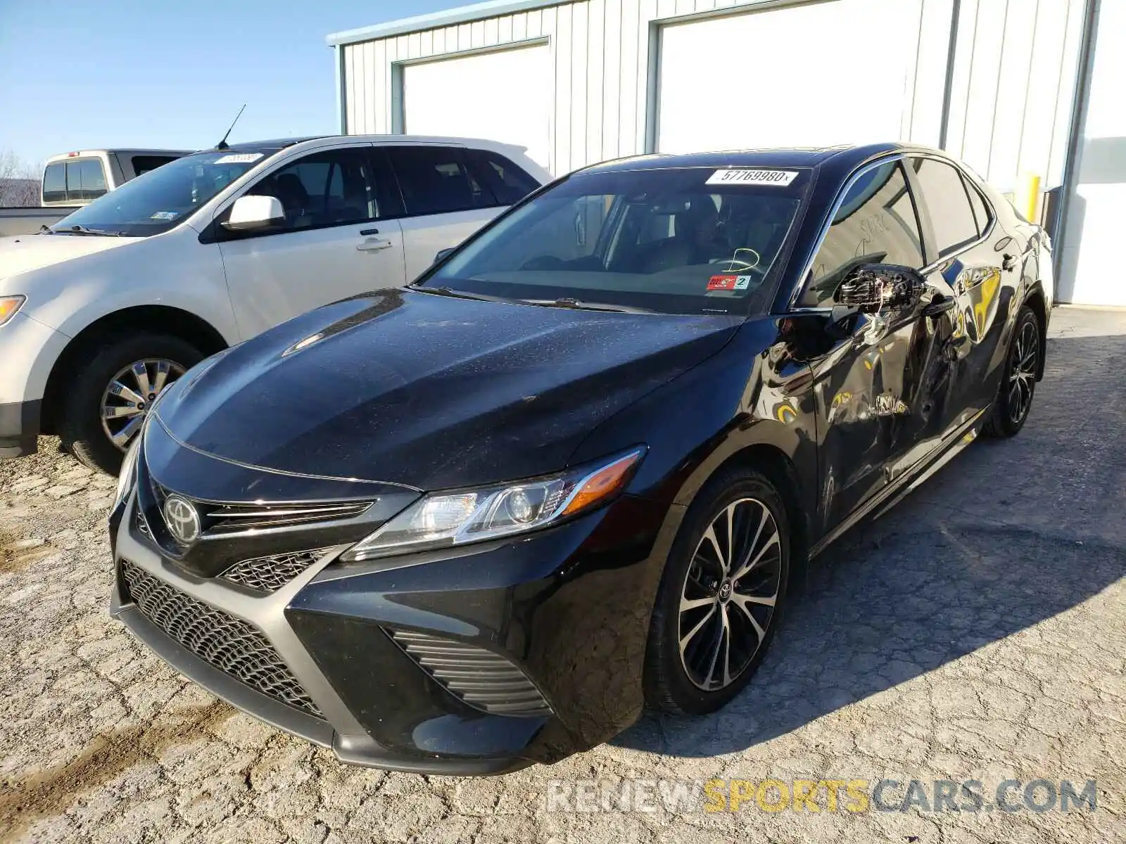 2 Photograph of a damaged car 4T1B11HK3KU196976 TOYOTA CAMRY 2019