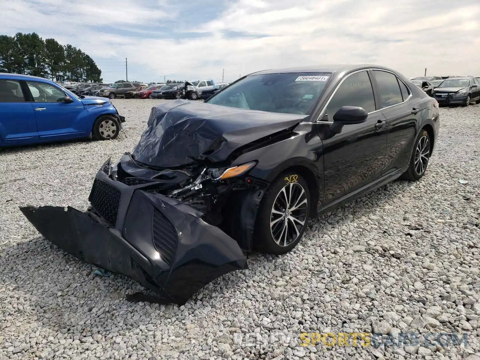 2 Photograph of a damaged car 4T1B11HK3KU207121 TOYOTA CAMRY 2019