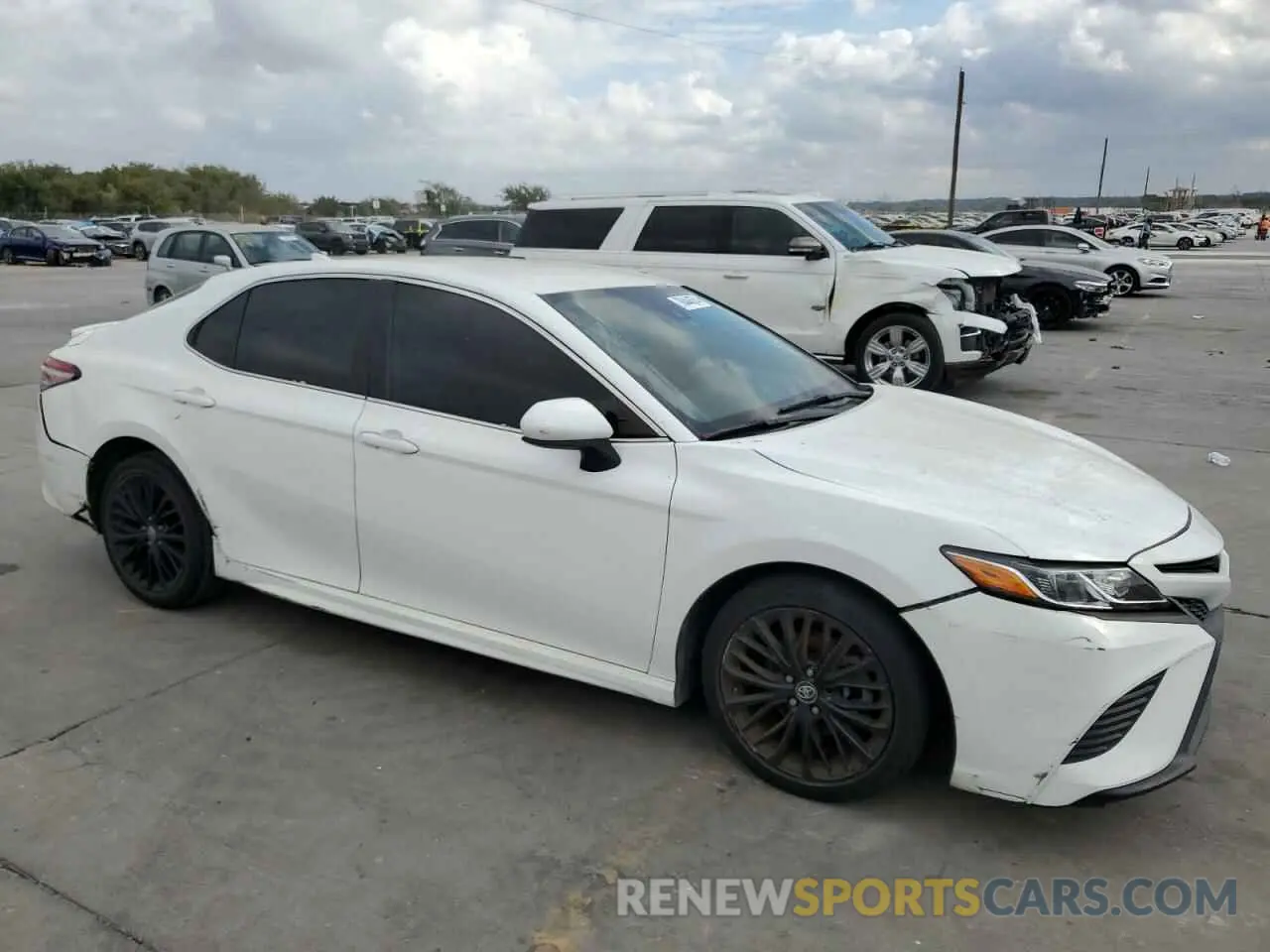 4 Photograph of a damaged car 4T1B11HK3KU208205 TOYOTA CAMRY 2019