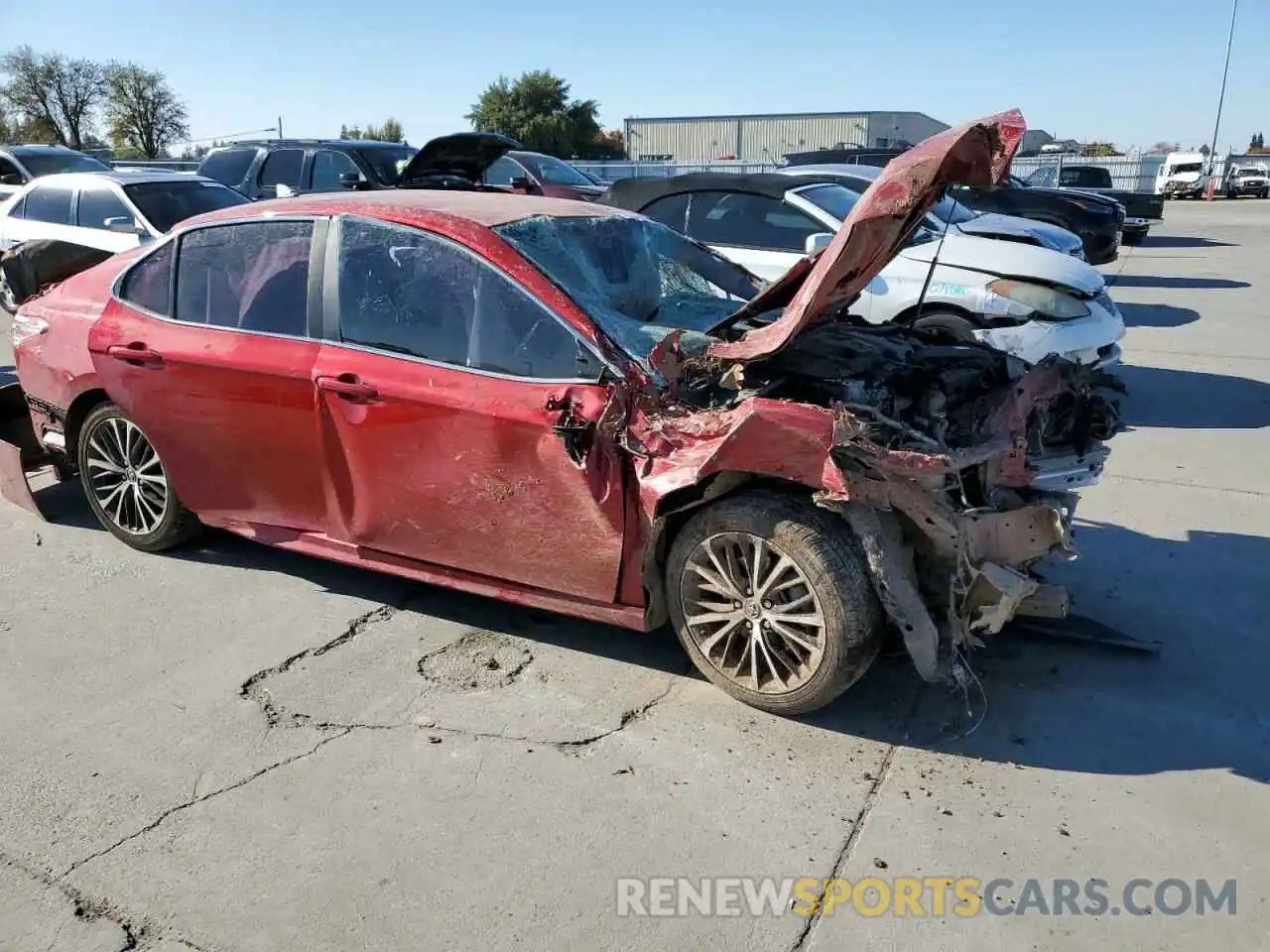 4 Photograph of a damaged car 4T1B11HK3KU210150 TOYOTA CAMRY 2019