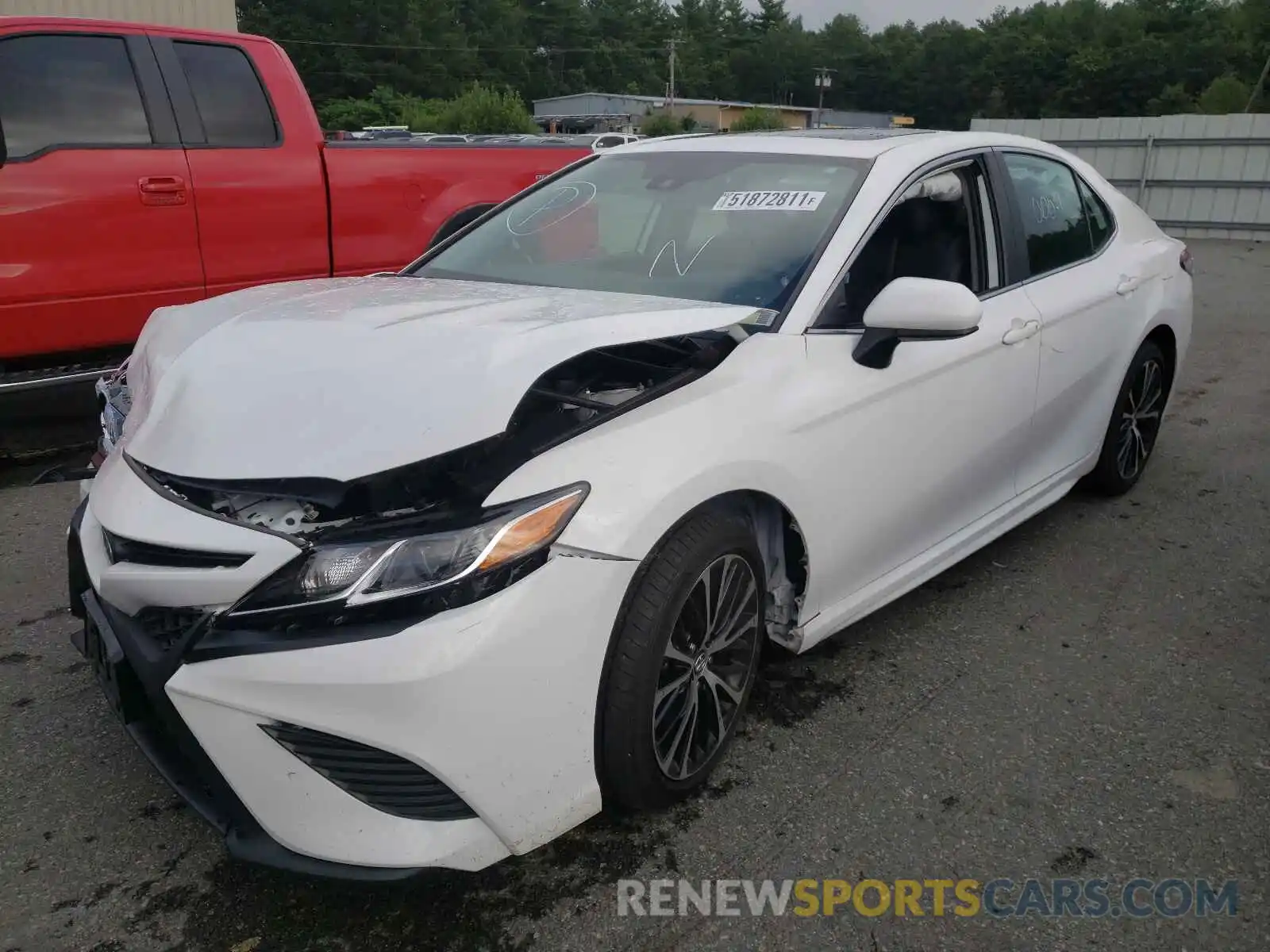 2 Photograph of a damaged car 4T1B11HK3KU220693 TOYOTA CAMRY 2019