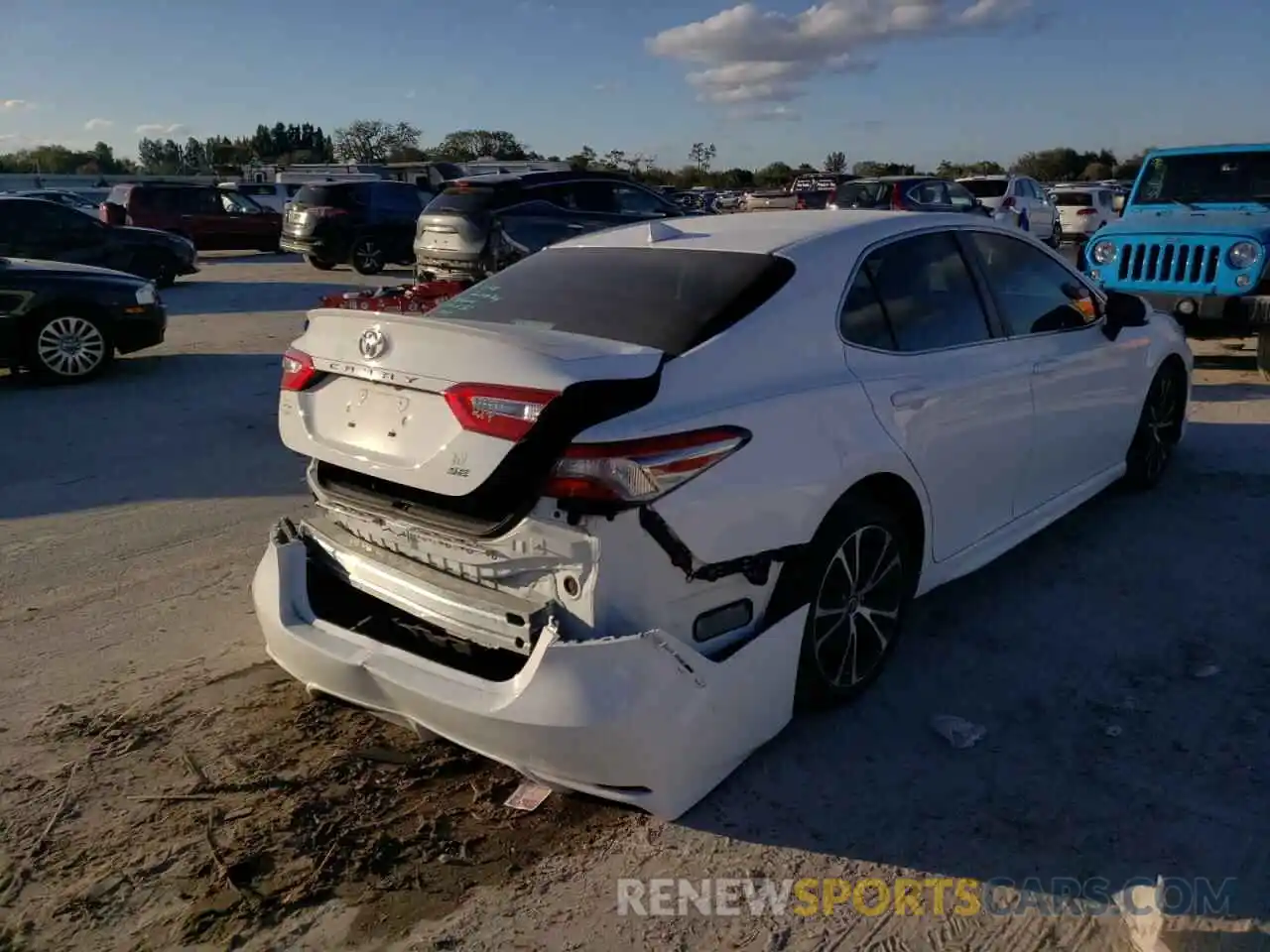 4 Photograph of a damaged car 4T1B11HK3KU224971 TOYOTA CAMRY 2019