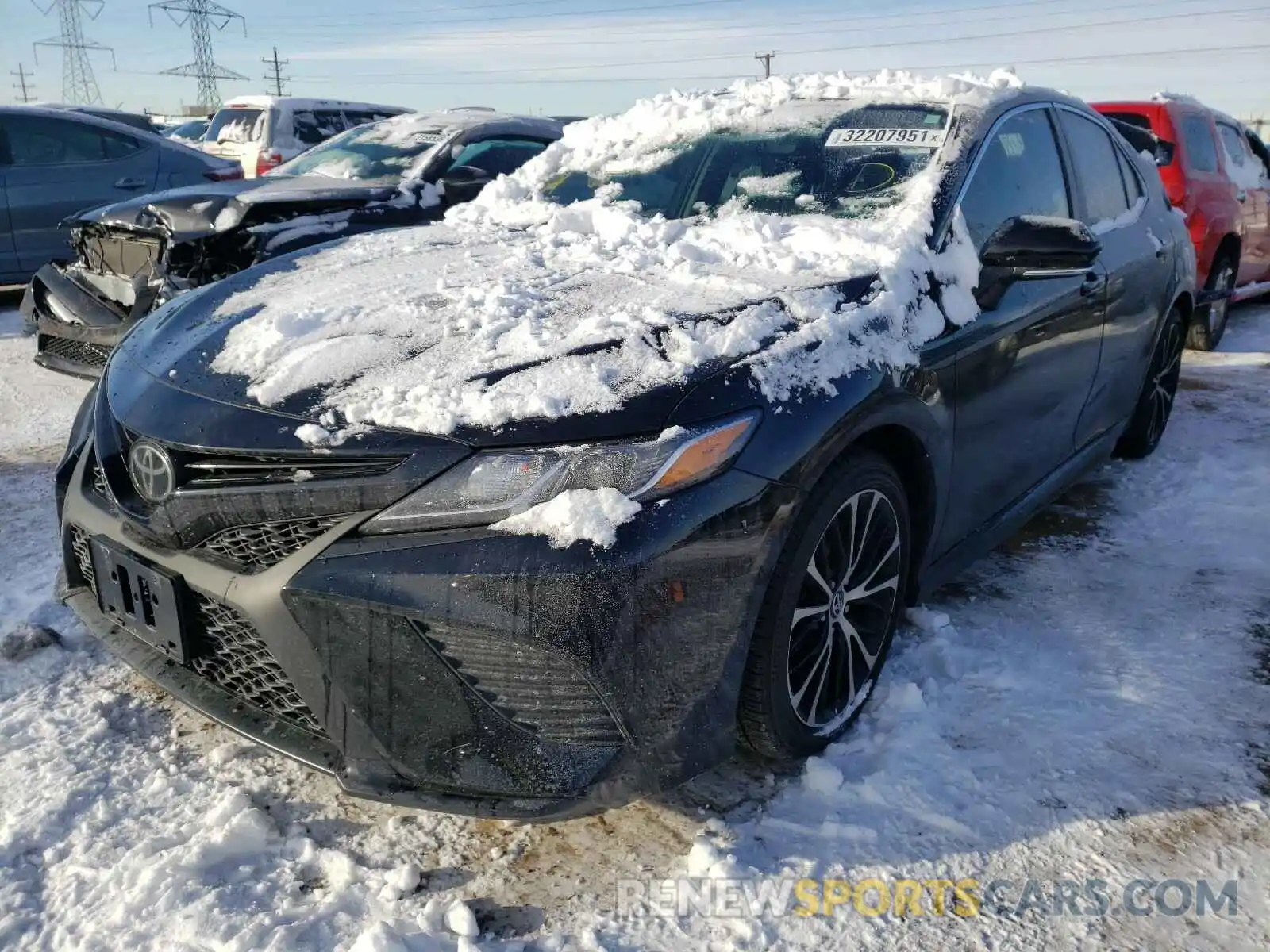 2 Photograph of a damaged car 4T1B11HK3KU228938 TOYOTA CAMRY 2019