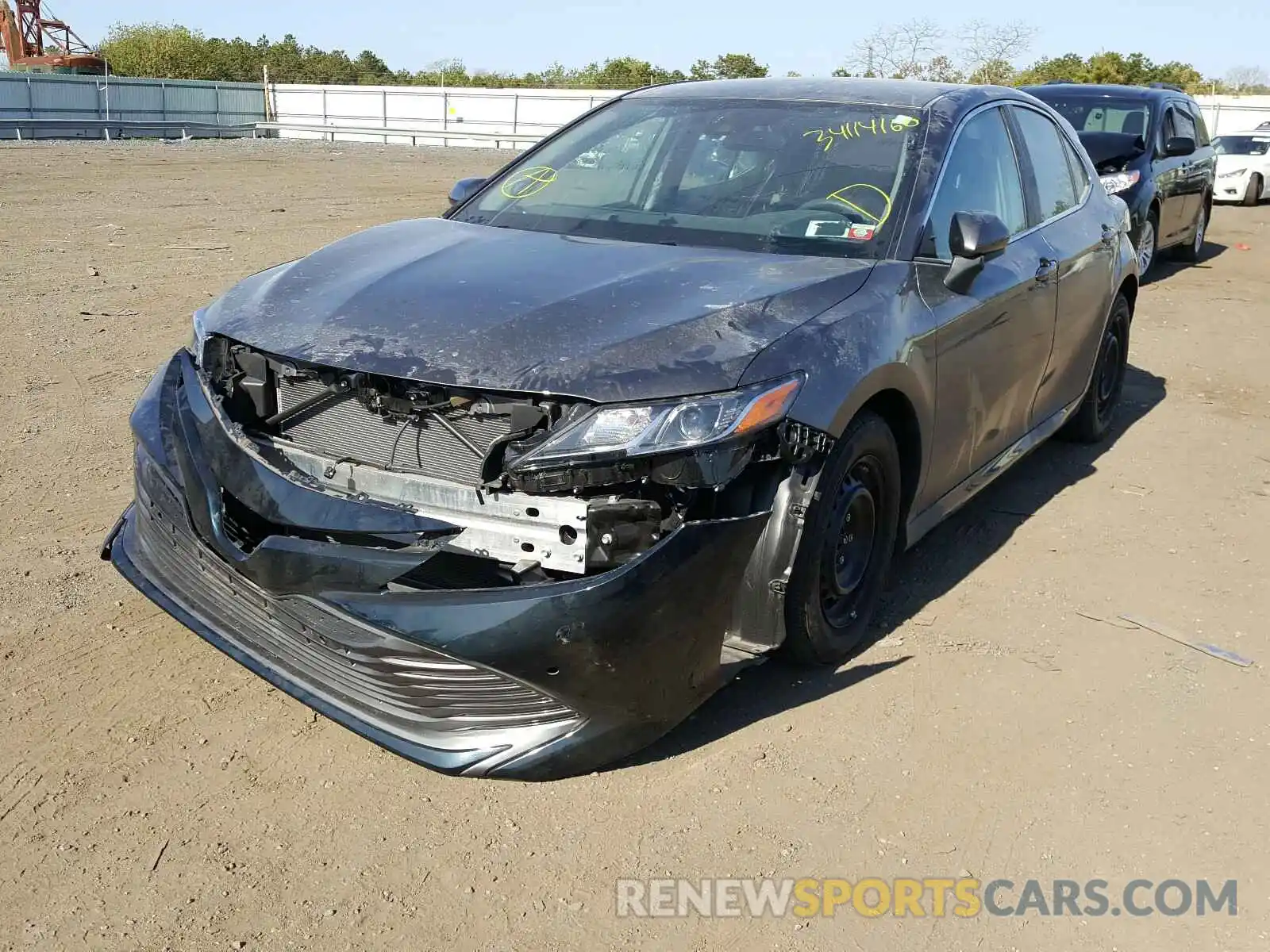 2 Photograph of a damaged car 4T1B11HK3KU246419 TOYOTA CAMRY 2019