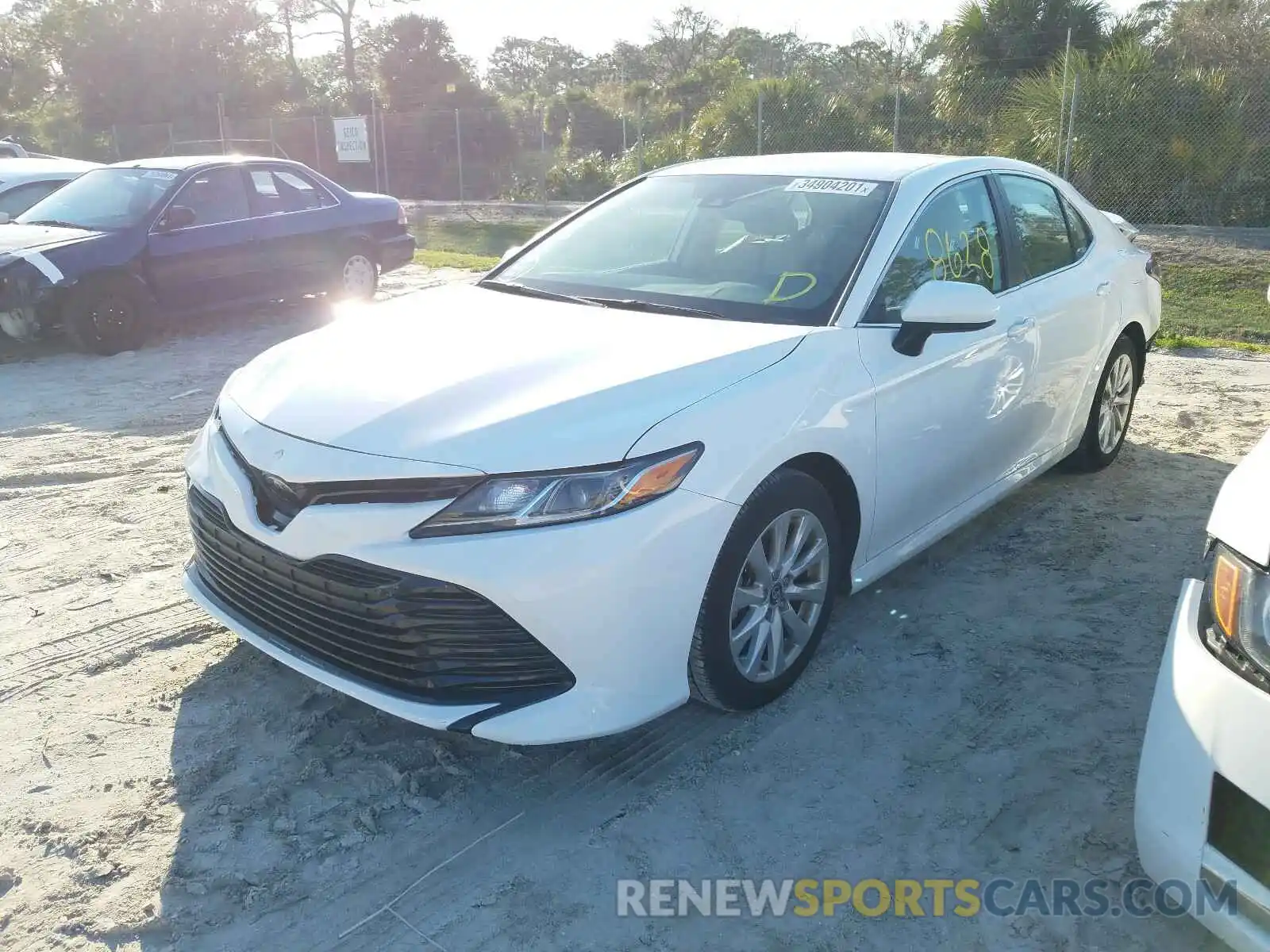 2 Photograph of a damaged car 4T1B11HK3KU259221 TOYOTA CAMRY 2019