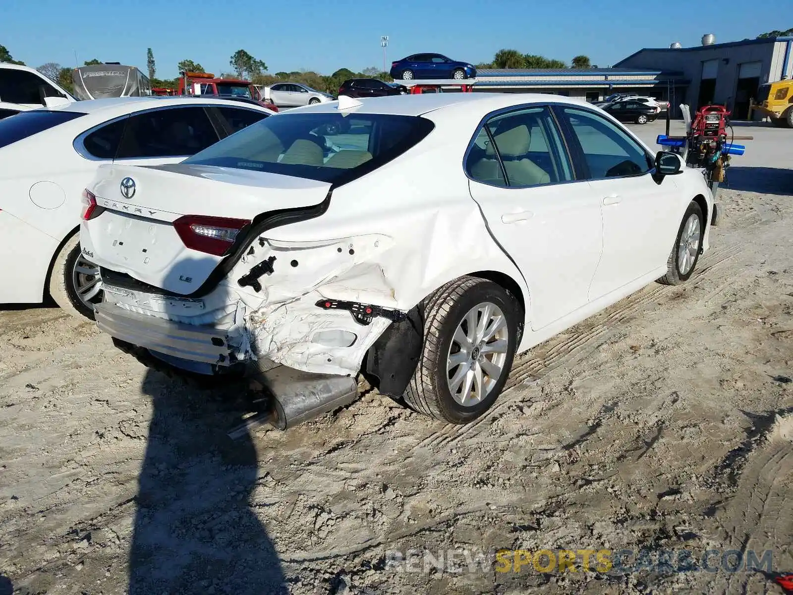 4 Photograph of a damaged car 4T1B11HK3KU259221 TOYOTA CAMRY 2019