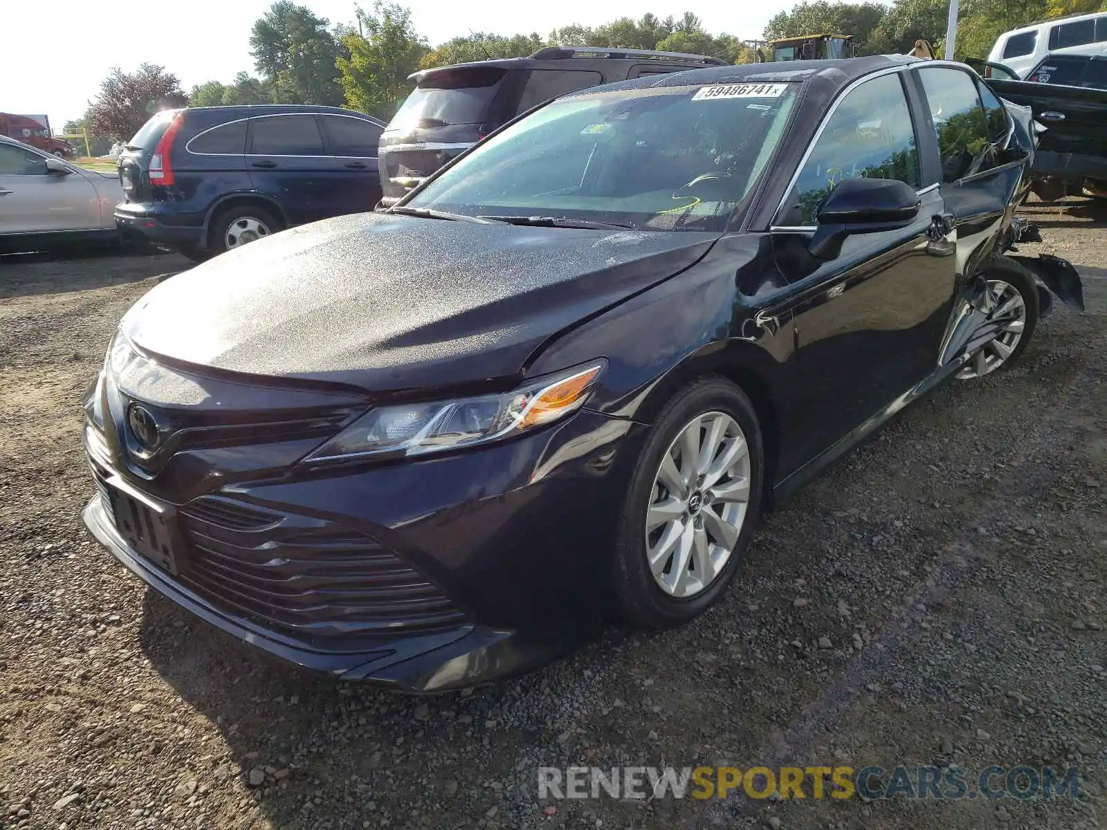 2 Photograph of a damaged car 4T1B11HK3KU269652 TOYOTA CAMRY 2019