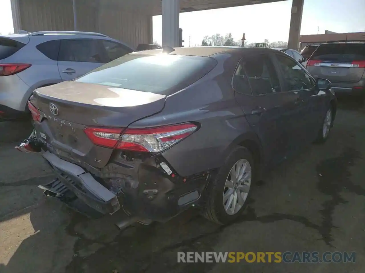 4 Photograph of a damaged car 4T1B11HK3KU284457 TOYOTA CAMRY 2019