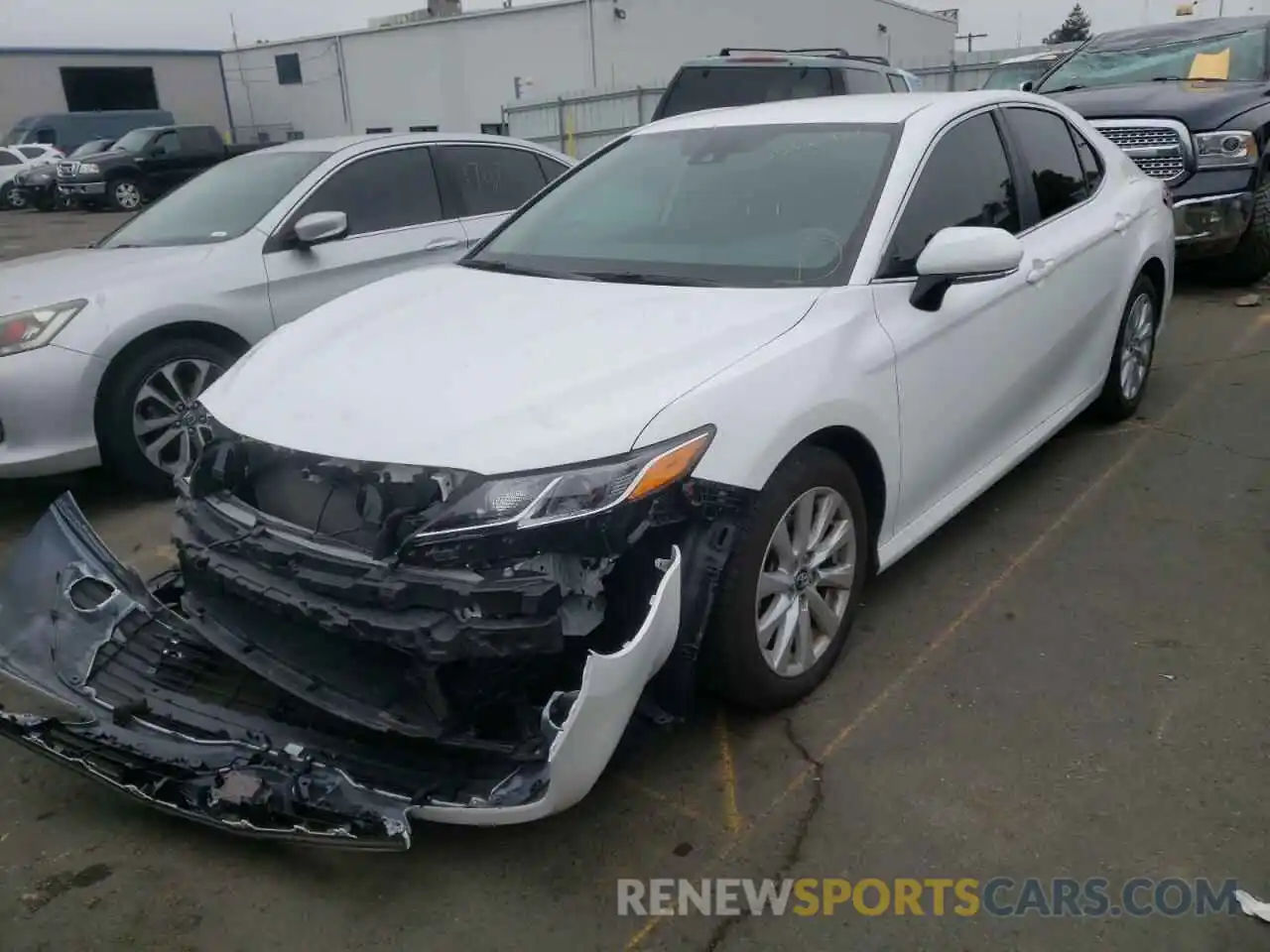 2 Photograph of a damaged car 4T1B11HK3KU285608 TOYOTA CAMRY 2019