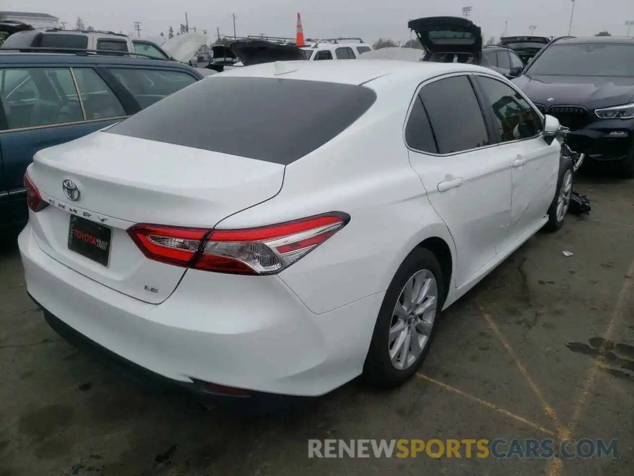 4 Photograph of a damaged car 4T1B11HK3KU285608 TOYOTA CAMRY 2019