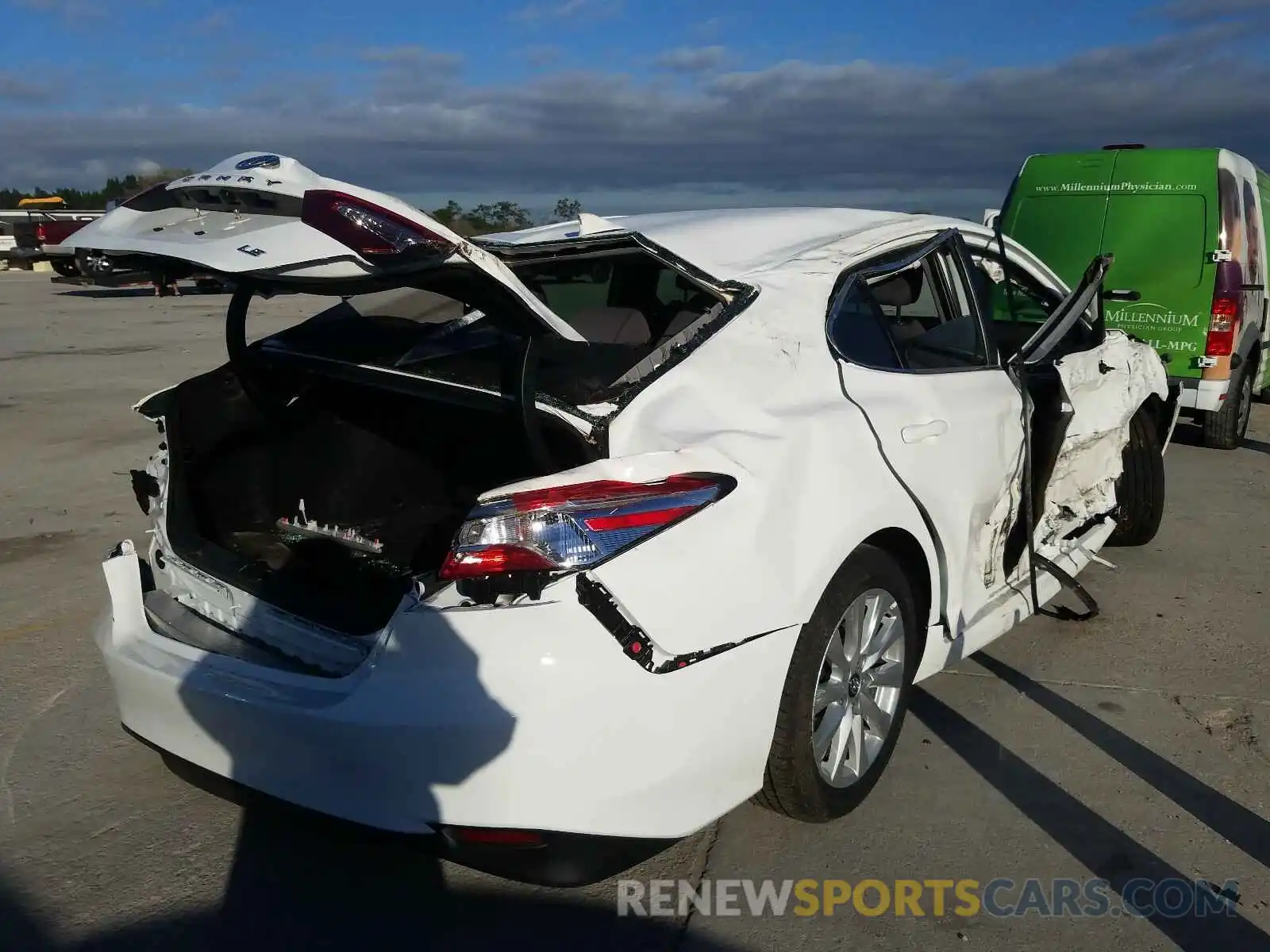 4 Photograph of a damaged car 4T1B11HK3KU290744 TOYOTA CAMRY 2019