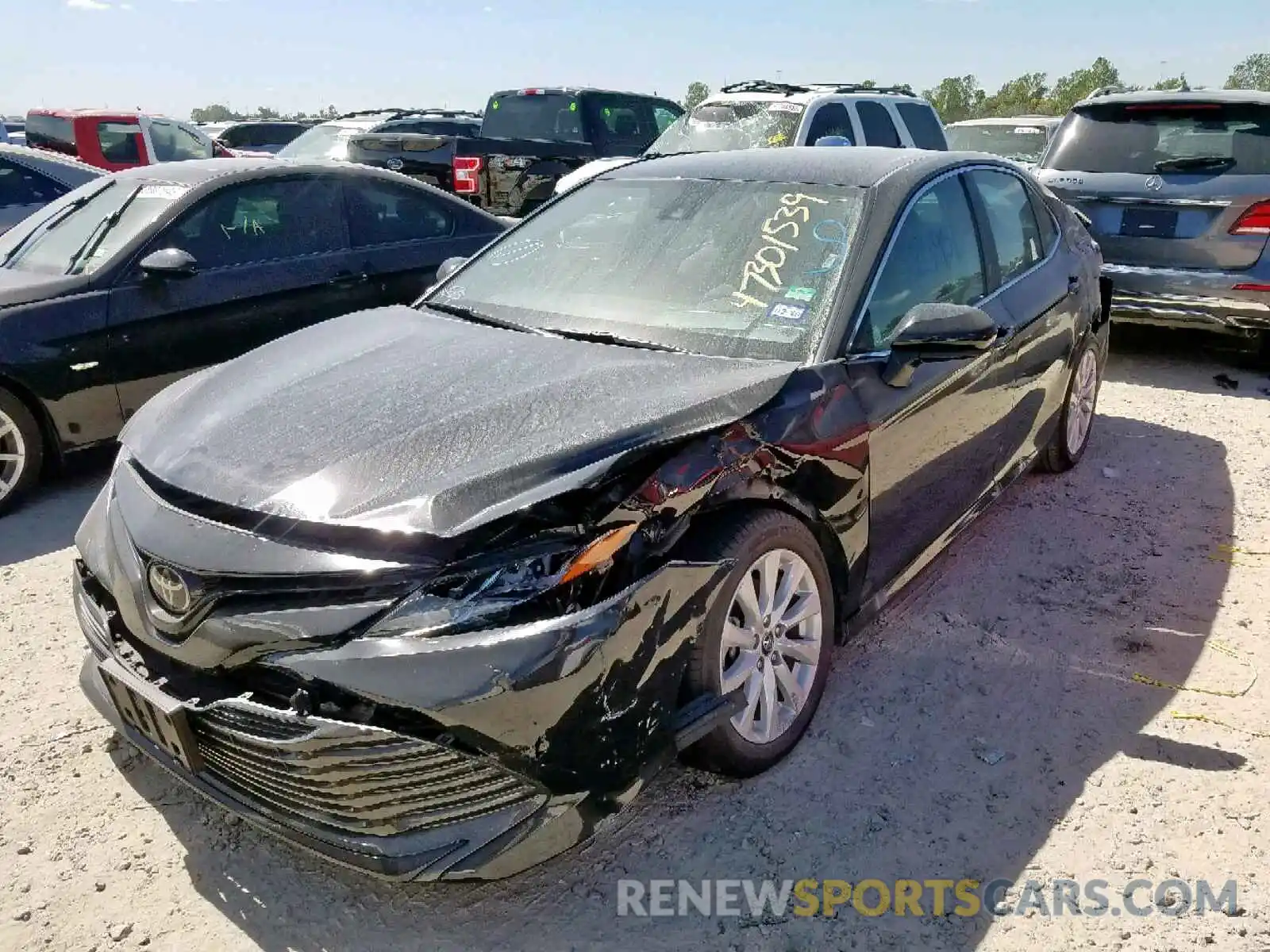 2 Photograph of a damaged car 4T1B11HK3KU681490 TOYOTA CAMRY 2019