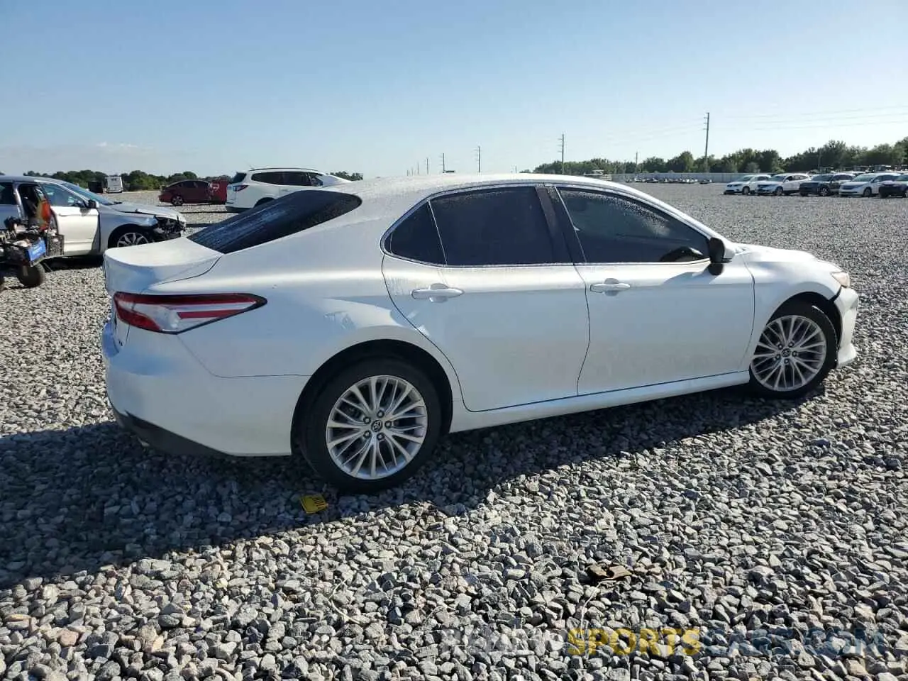 3 Photograph of a damaged car 4T1B11HK3KU683739 TOYOTA CAMRY 2019
