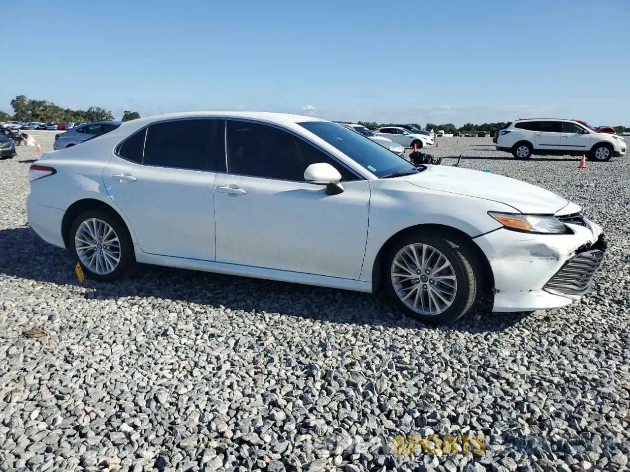 4 Photograph of a damaged car 4T1B11HK3KU683739 TOYOTA CAMRY 2019