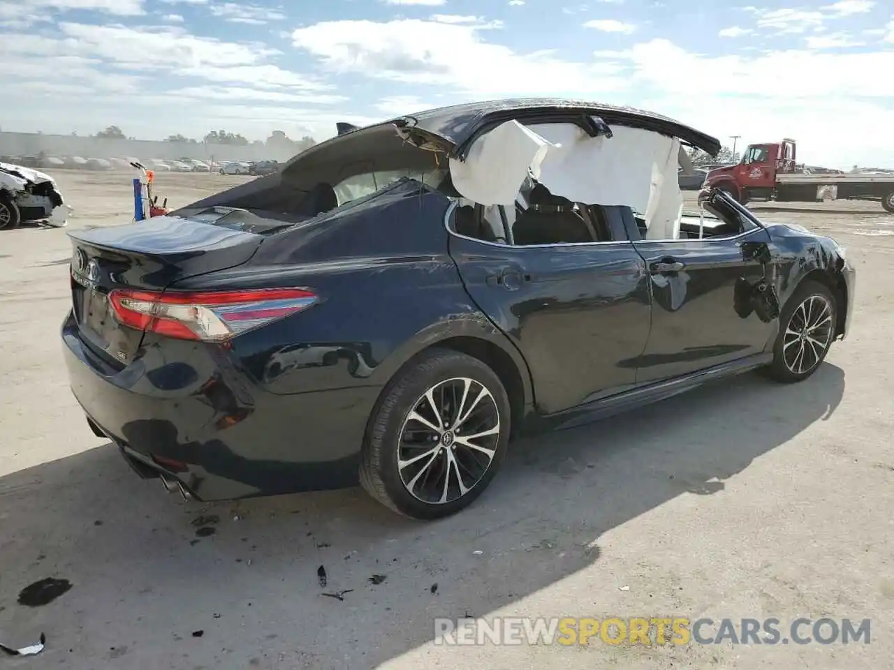 3 Photograph of a damaged car 4T1B11HK3KU692831 TOYOTA CAMRY 2019