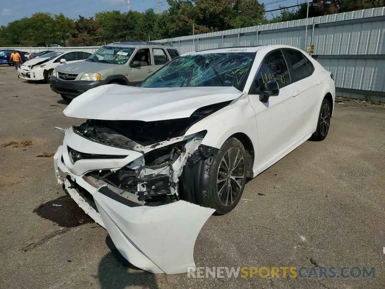 2 Photograph of a damaged car 4T1B11HK3KU694093 TOYOTA CAMRY 2019