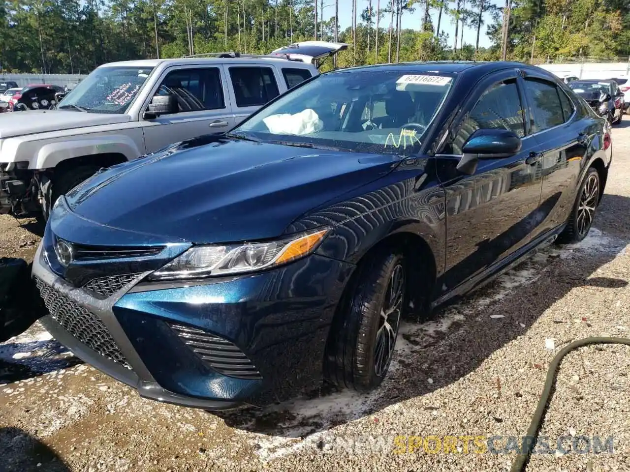 2 Photograph of a damaged car 4T1B11HK3KU694319 TOYOTA CAMRY 2019