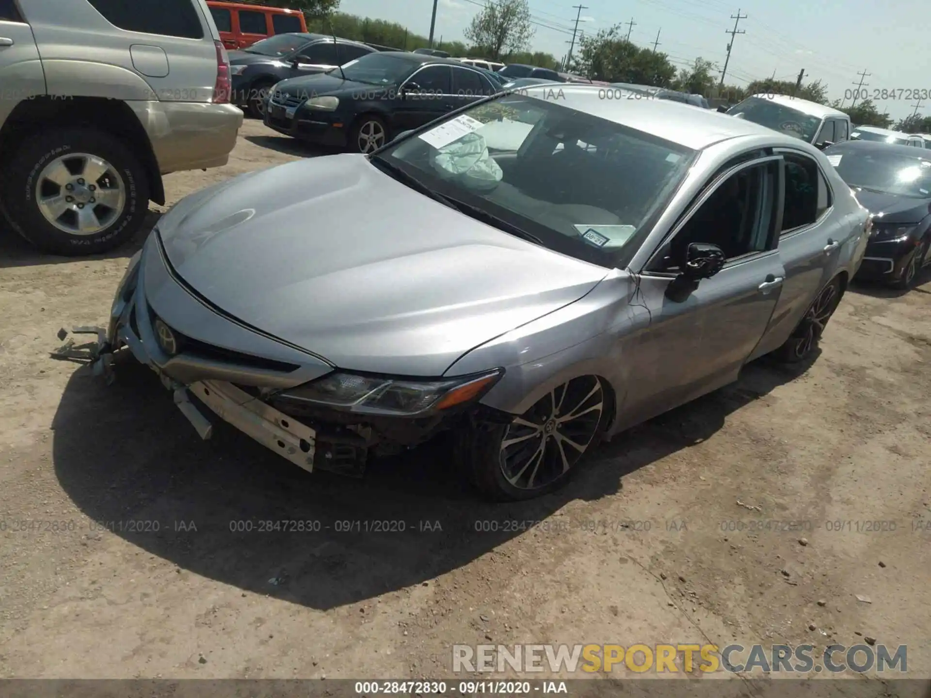 2 Photograph of a damaged car 4T1B11HK3KU702533 TOYOTA CAMRY 2019