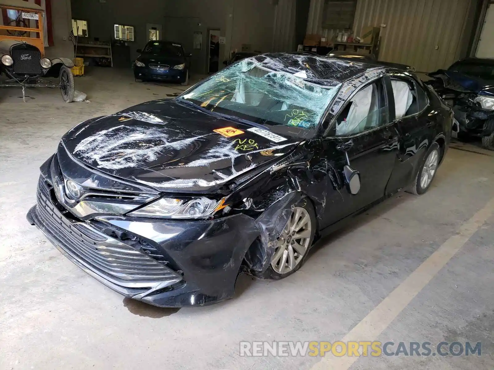 2 Photograph of a damaged car 4T1B11HK3KU710938 TOYOTA CAMRY 2019