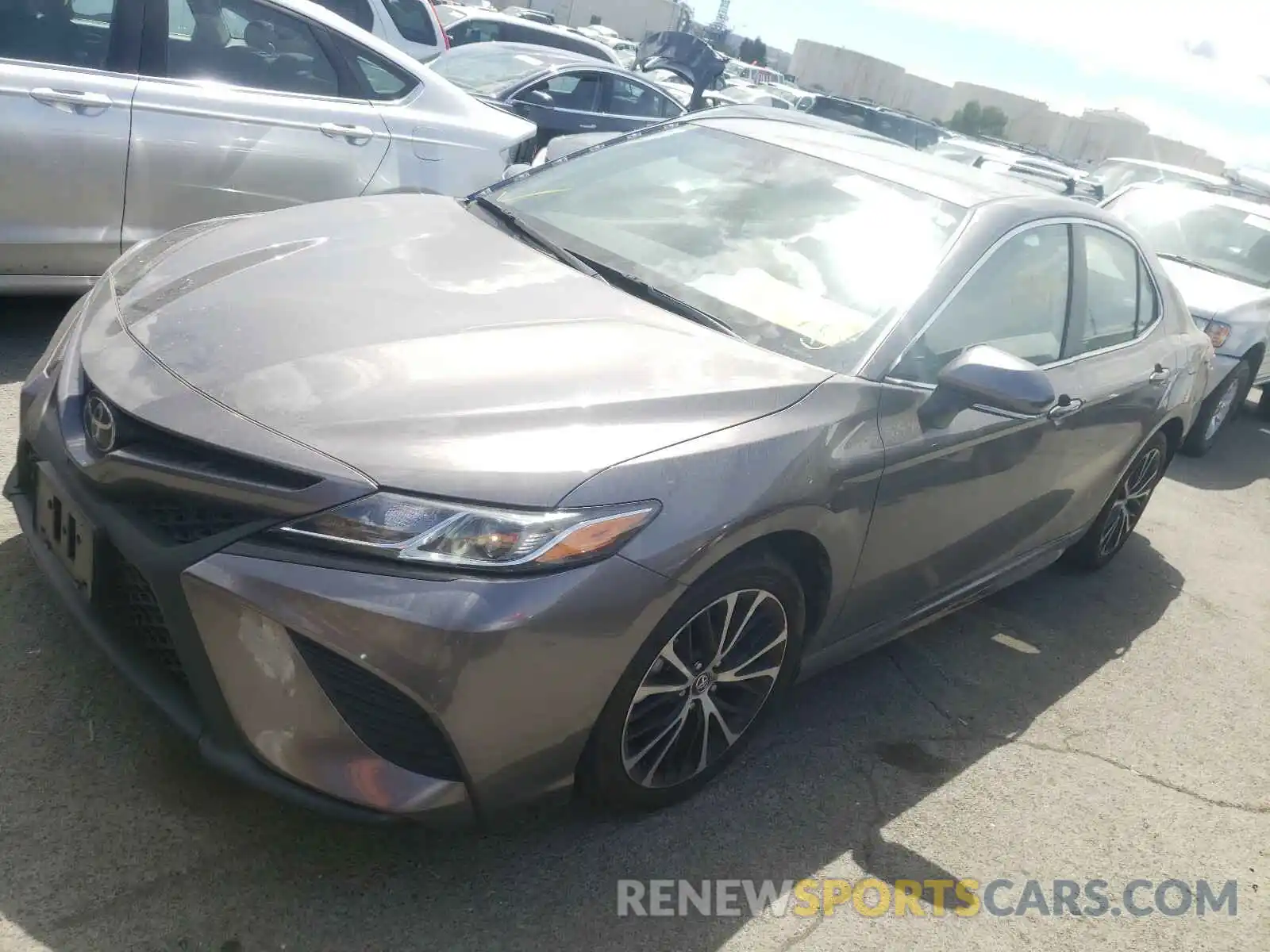 2 Photograph of a damaged car 4T1B11HK3KU713449 TOYOTA CAMRY 2019