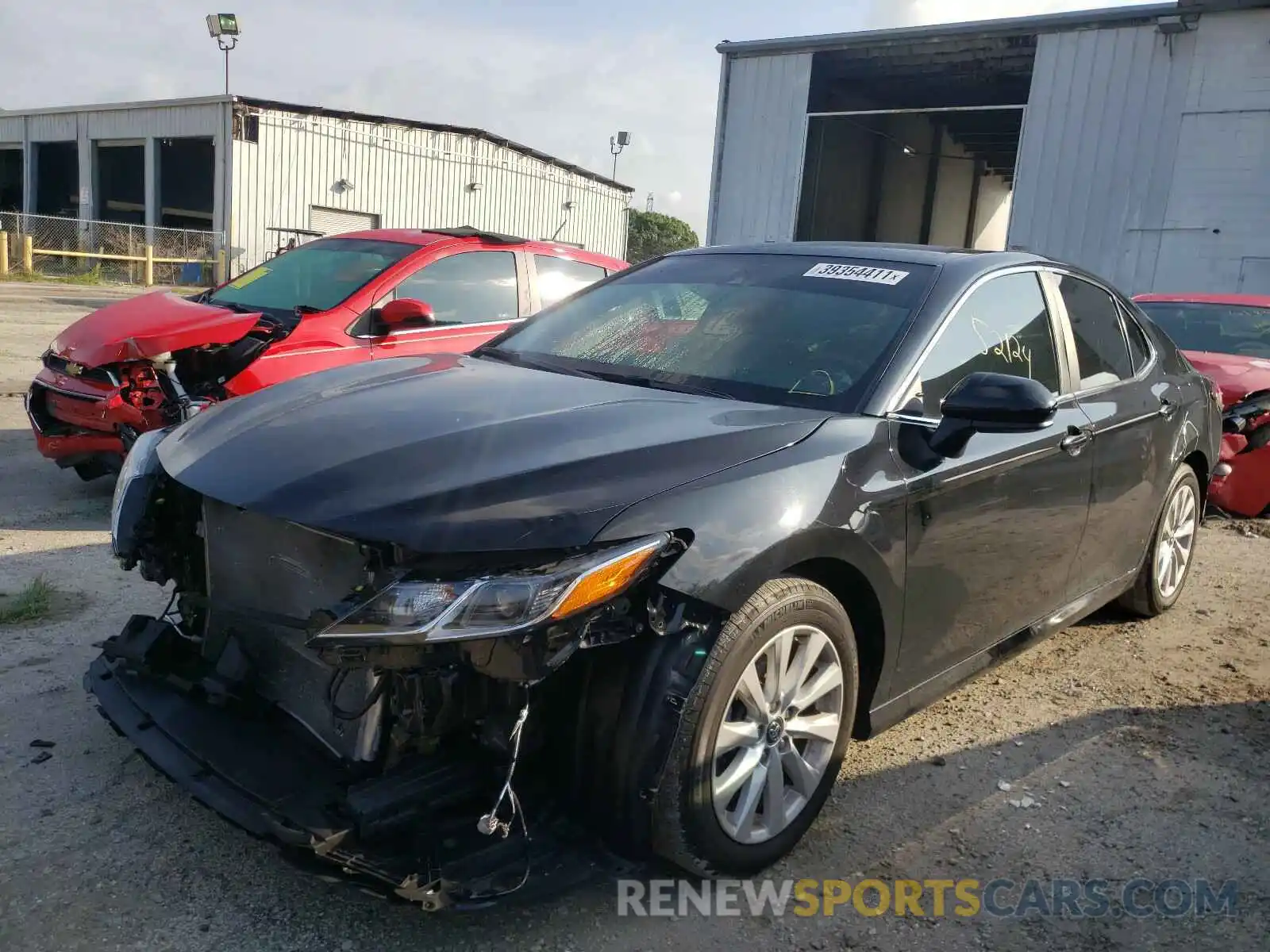 2 Photograph of a damaged car 4T1B11HK3KU716819 TOYOTA CAMRY 2019