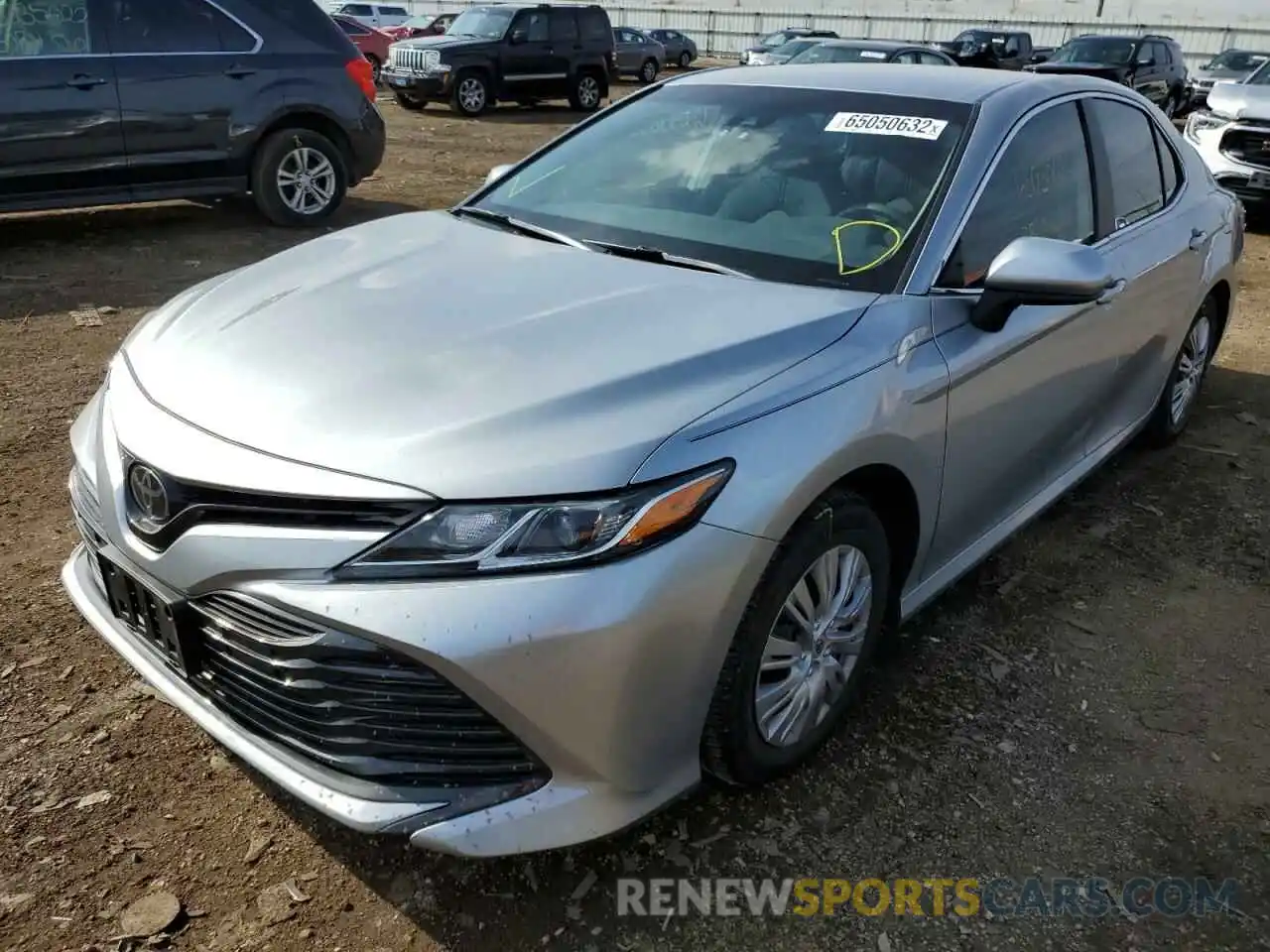 2 Photograph of a damaged car 4T1B11HK3KU720305 TOYOTA CAMRY 2019