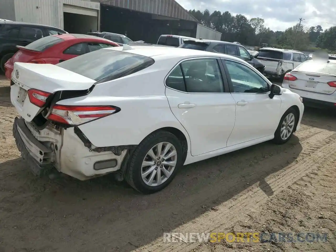 3 Photograph of a damaged car 4T1B11HK3KU721874 TOYOTA CAMRY 2019