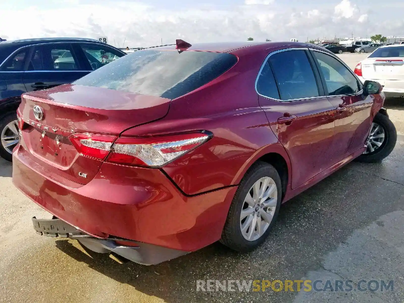 4 Photograph of a damaged car 4T1B11HK3KU734561 TOYOTA CAMRY 2019