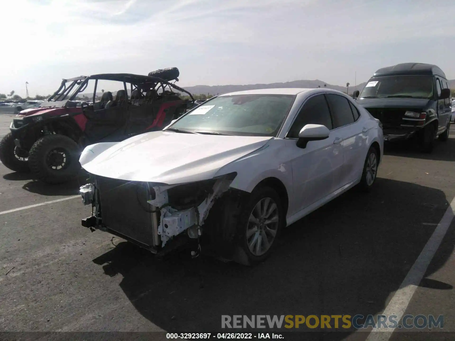 2 Photograph of a damaged car 4T1B11HK3KU738593 TOYOTA CAMRY 2019