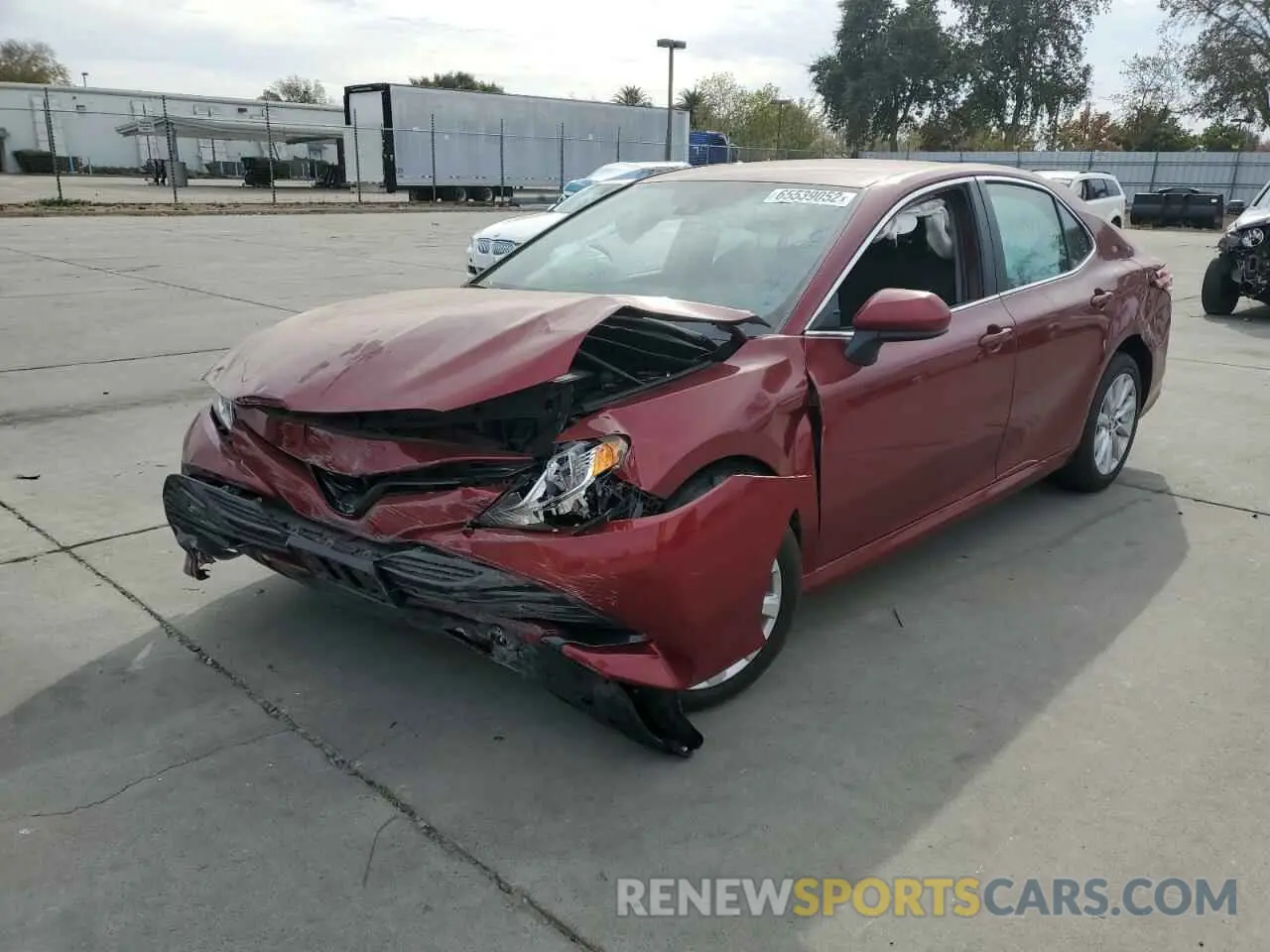 2 Photograph of a damaged car 4T1B11HK3KU744975 TOYOTA CAMRY 2019