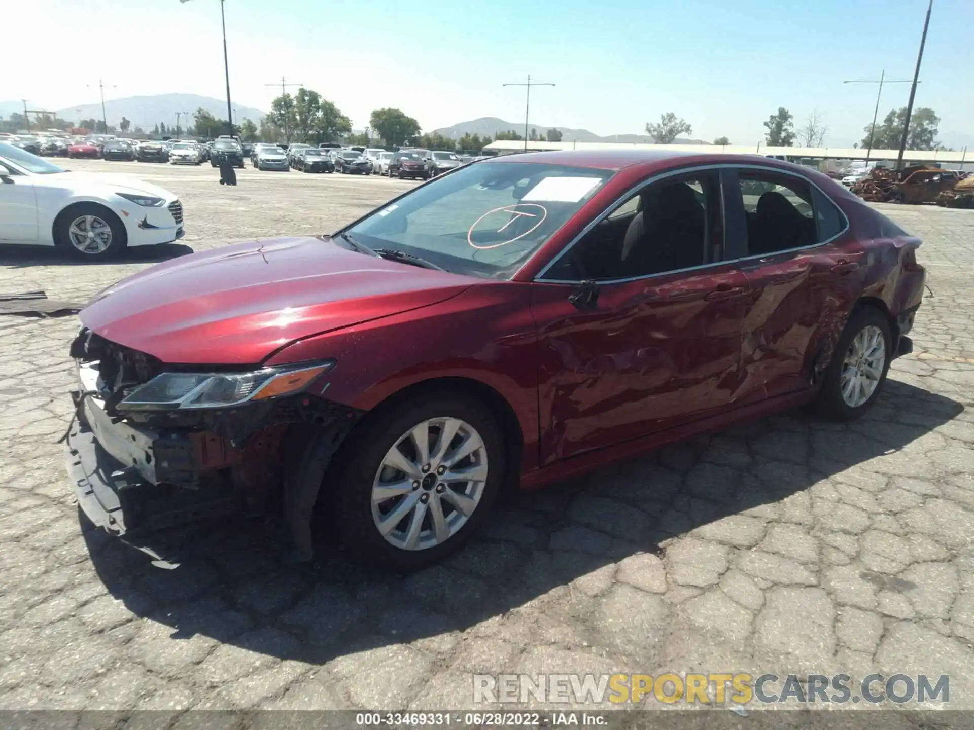 2 Photograph of a damaged car 4T1B11HK3KU753868 TOYOTA CAMRY 2019