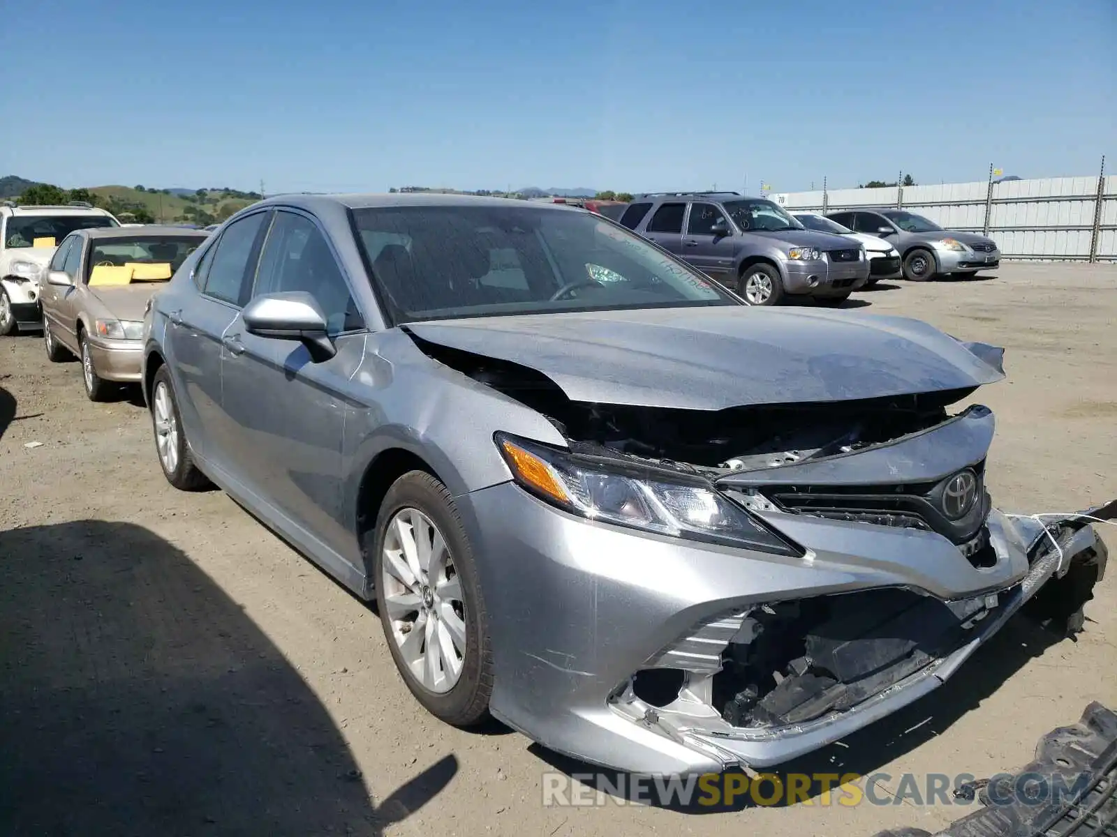 1 Photograph of a damaged car 4T1B11HK3KU765227 TOYOTA CAMRY 2019