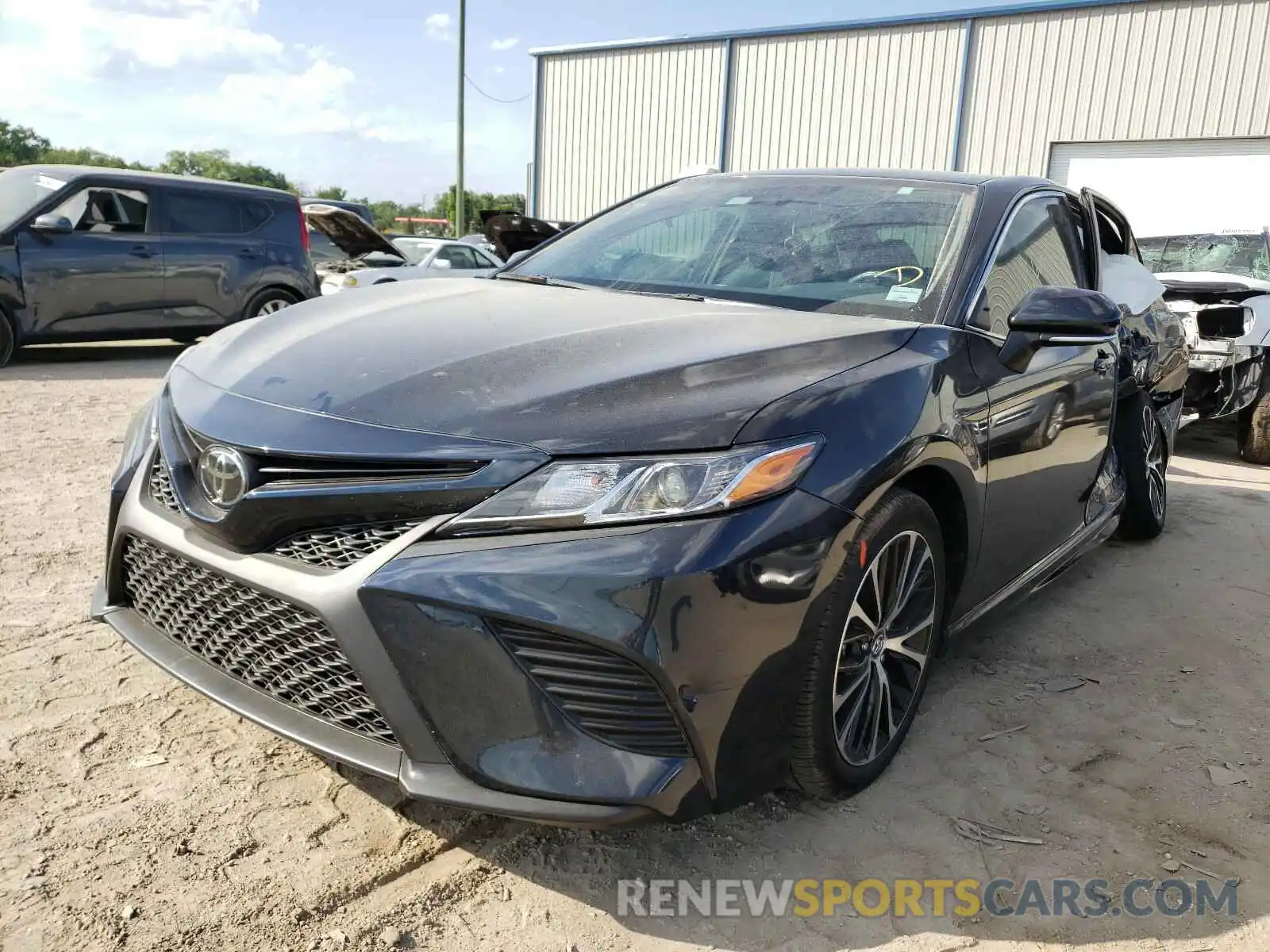 2 Photograph of a damaged car 4T1B11HK3KU771660 TOYOTA CAMRY 2019