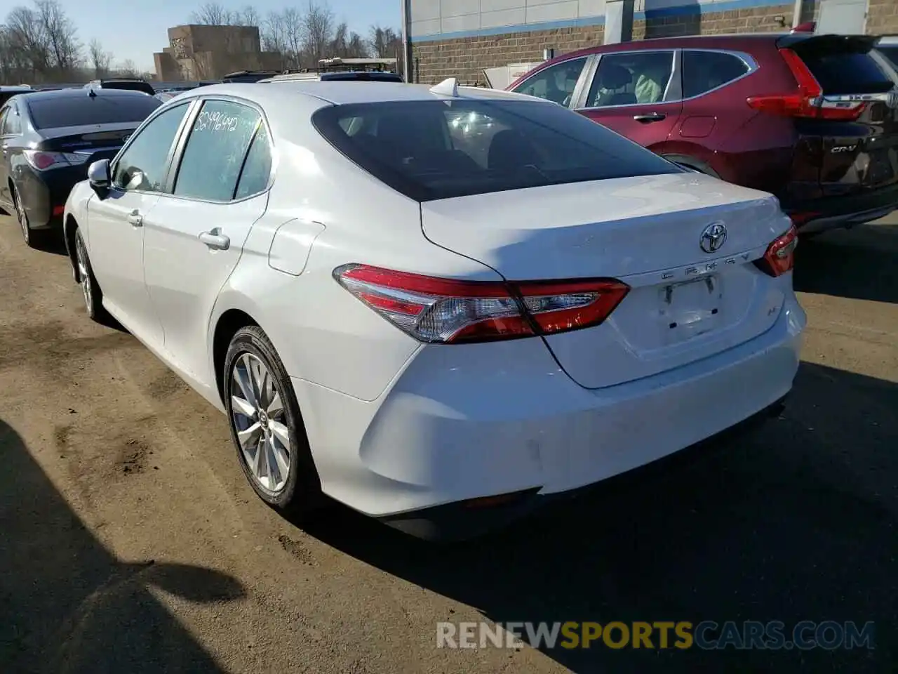 3 Photograph of a damaged car 4T1B11HK3KU774039 TOYOTA CAMRY 2019