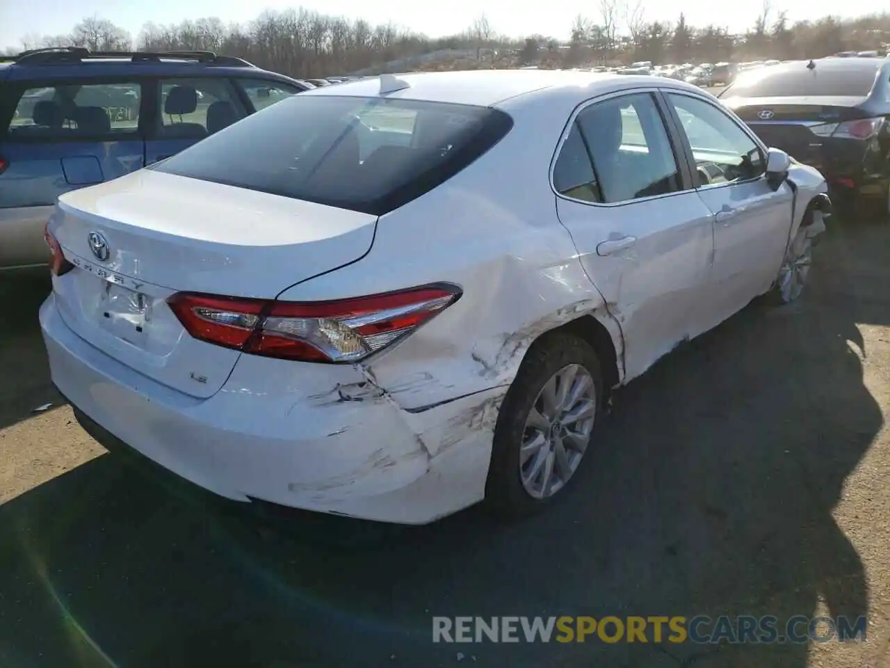 4 Photograph of a damaged car 4T1B11HK3KU774039 TOYOTA CAMRY 2019