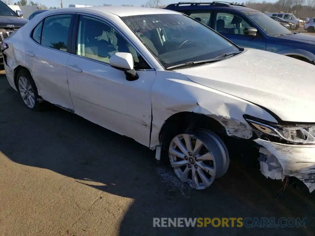 9 Photograph of a damaged car 4T1B11HK3KU774039 TOYOTA CAMRY 2019