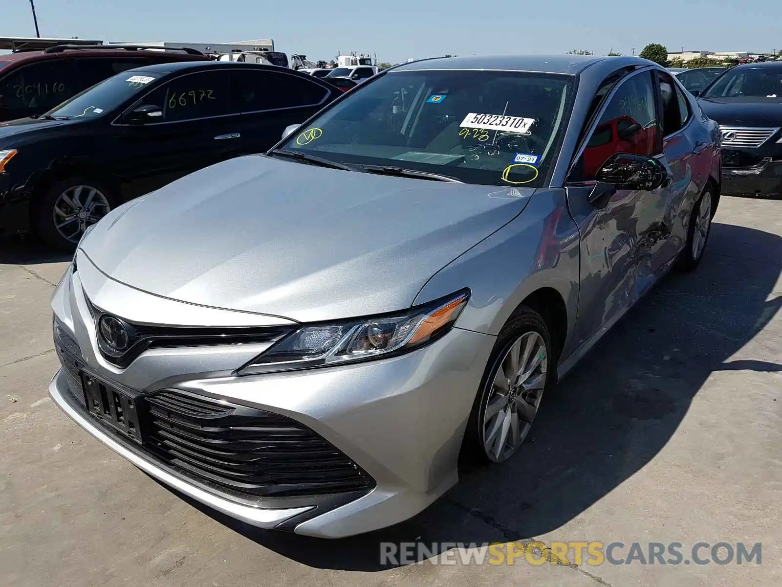 2 Photograph of a damaged car 4T1B11HK3KU775630 TOYOTA CAMRY 2019