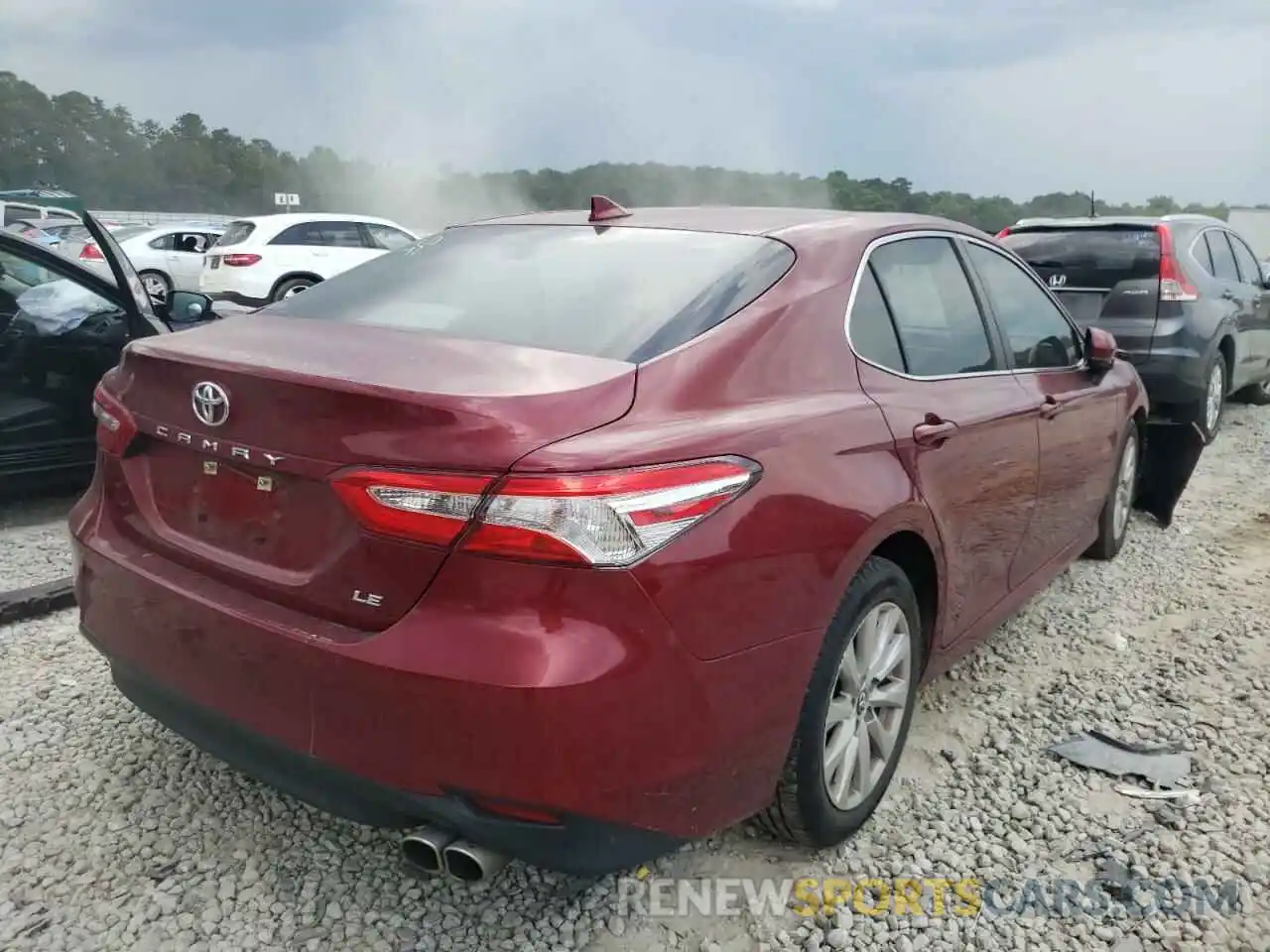 4 Photograph of a damaged car 4T1B11HK3KU780925 TOYOTA CAMRY 2019