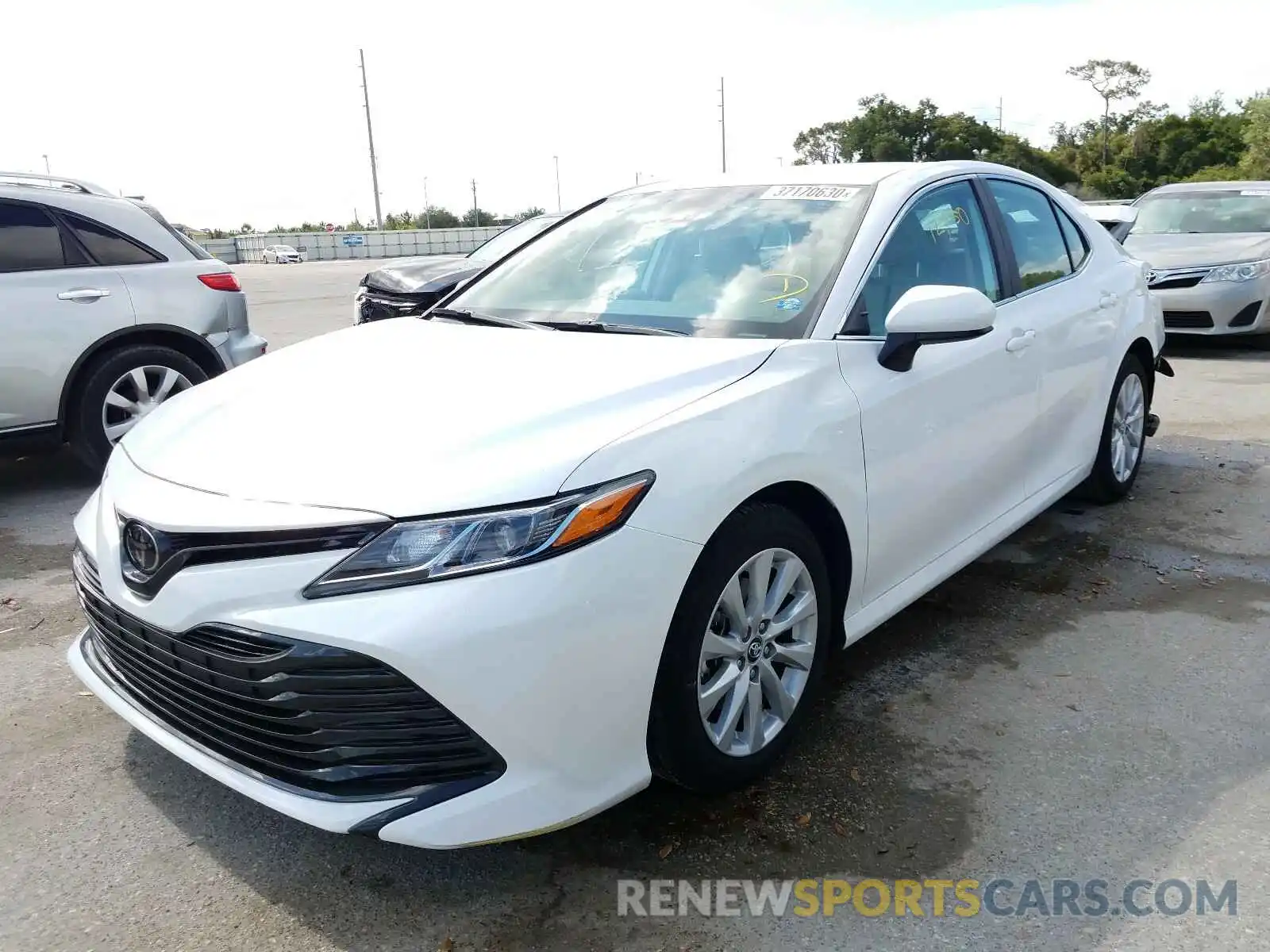 2 Photograph of a damaged car 4T1B11HK3KU791830 TOYOTA CAMRY 2019